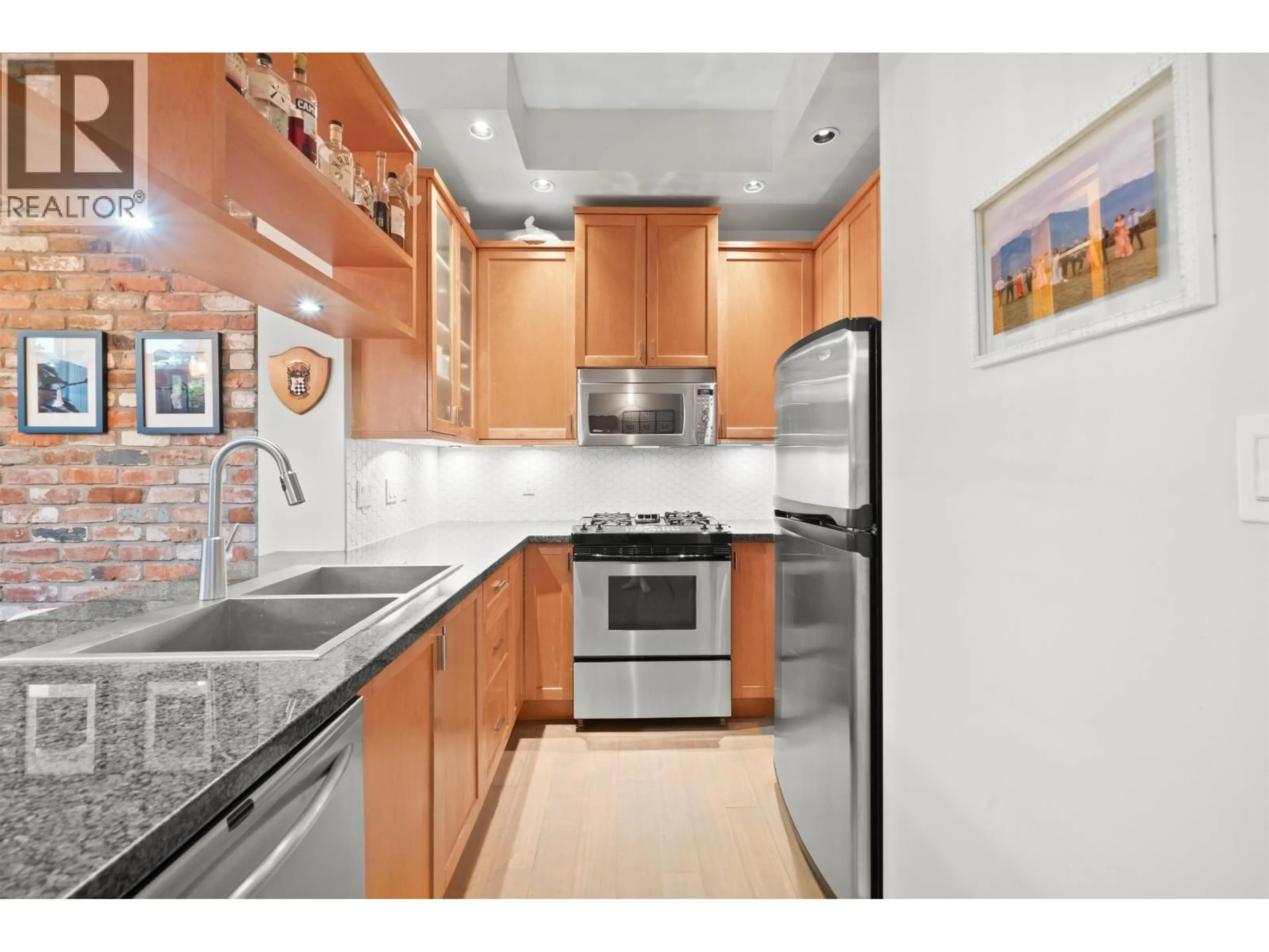 Standard kitchen, ceramic/tile floor for 207 - 2515 ONTARIO STREET, Vancouver British Columbia V5T4V4