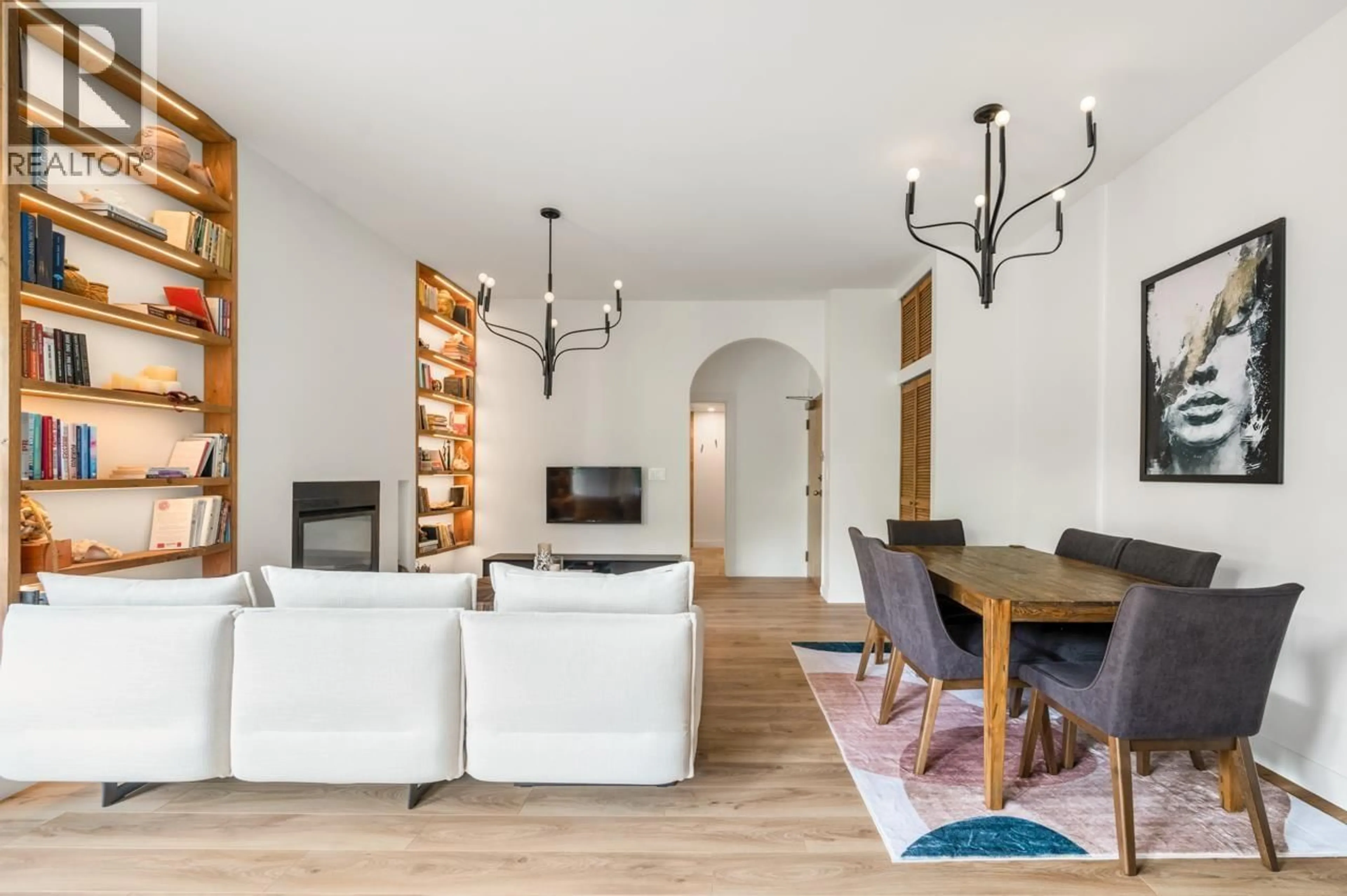 Living room with furniture, wood/laminate floor for 102 - 410 CARNARVON STREET, New Westminster British Columbia V3L5N9