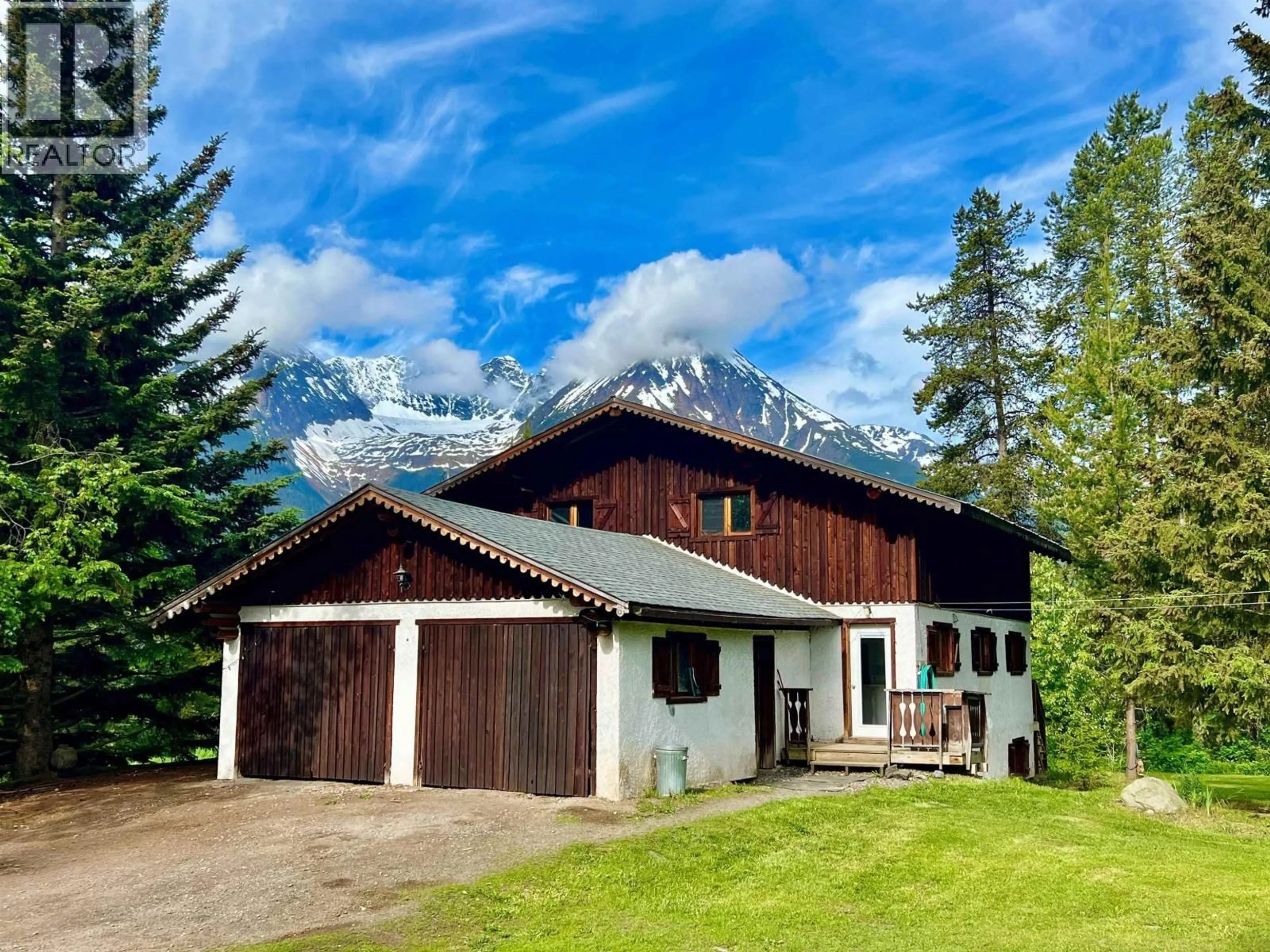 A pic from outside/outdoor area/front of a property/back of a property/a pic from drone, mountain view for 5860 STENMAN ROAD, Smithers British Columbia V0J2N2