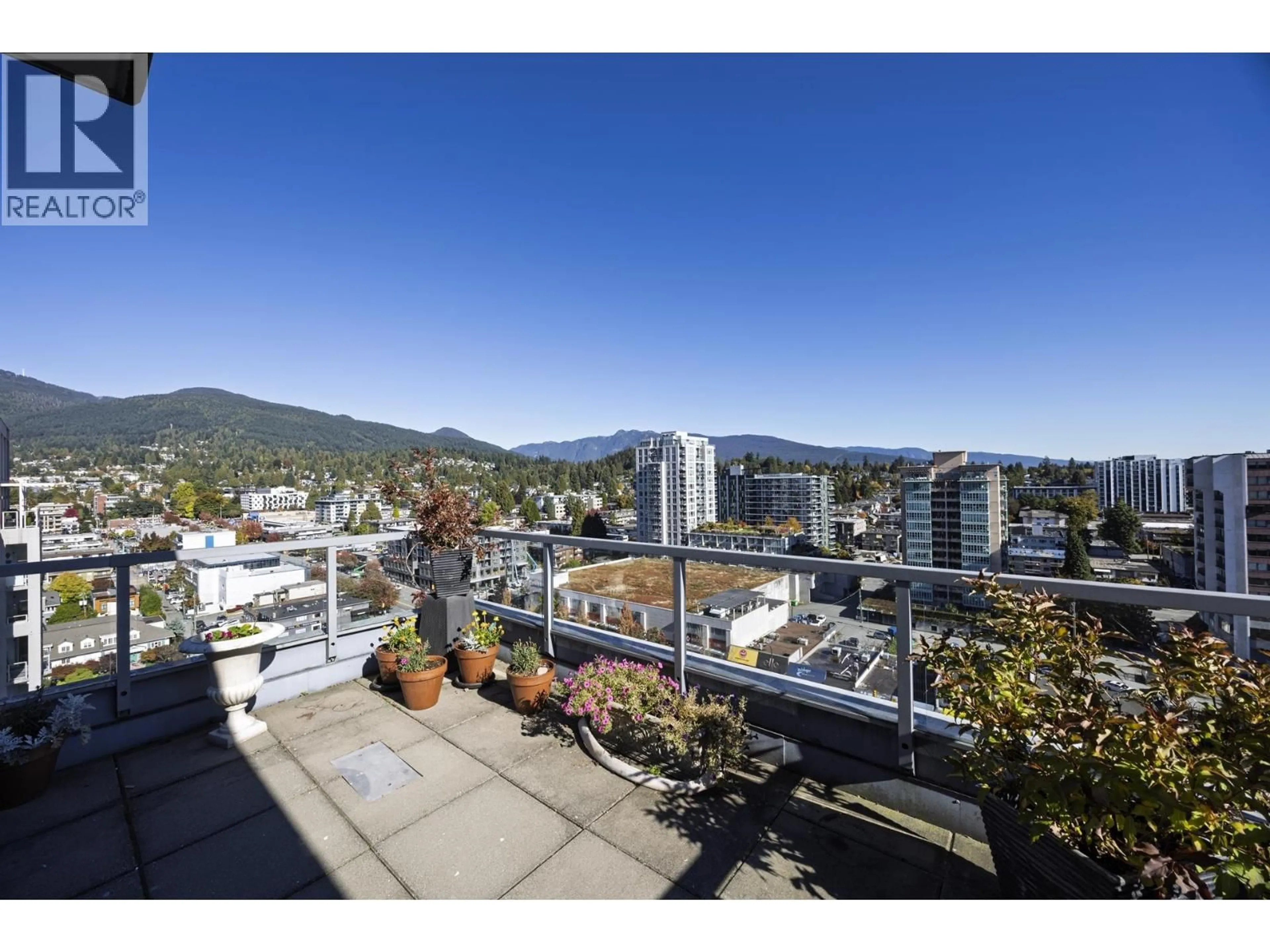 A pic from outside/outdoor area/front of a property/back of a property/a pic from drone, mountain view for 1702 - 121 16TH STREET, North Vancouver British Columbia V7M3P4