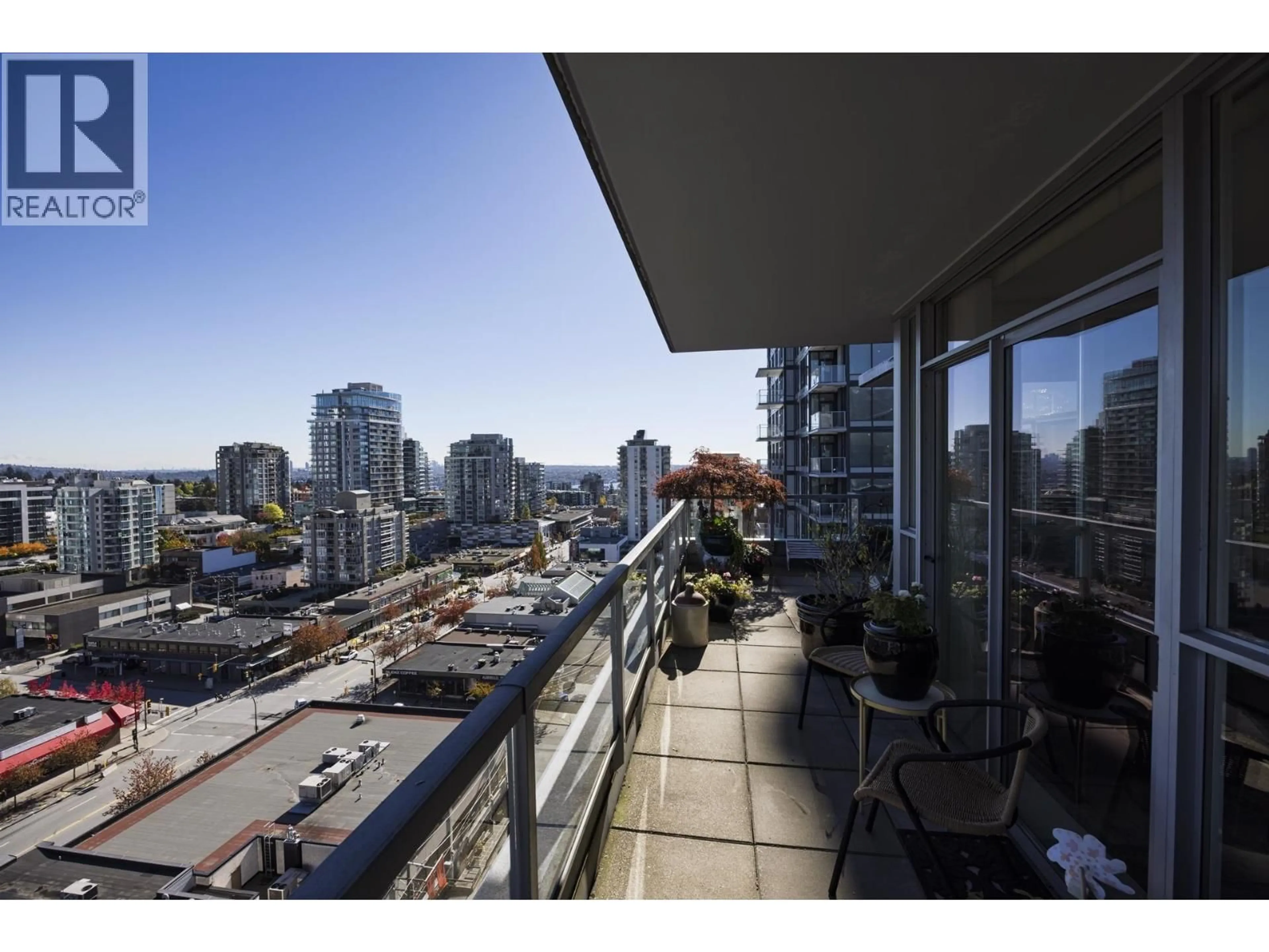 Patio, city buildings view from balcony for 1702 - 121 16TH STREET, North Vancouver British Columbia V7M3P4