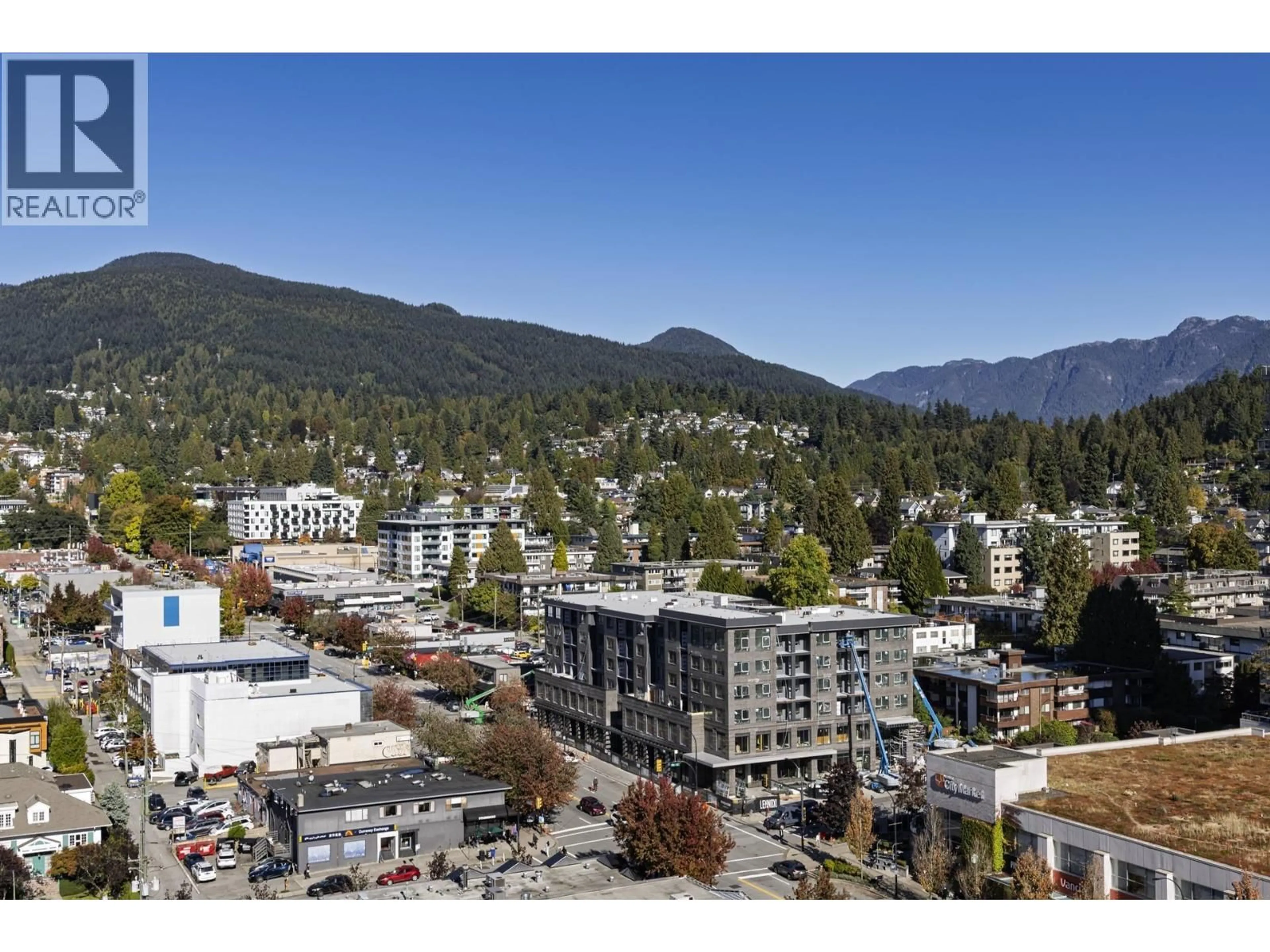 A pic from outside/outdoor area/front of a property/back of a property/a pic from drone, mountain view for 1702 - 121 16TH STREET, North Vancouver British Columbia V7M3P4