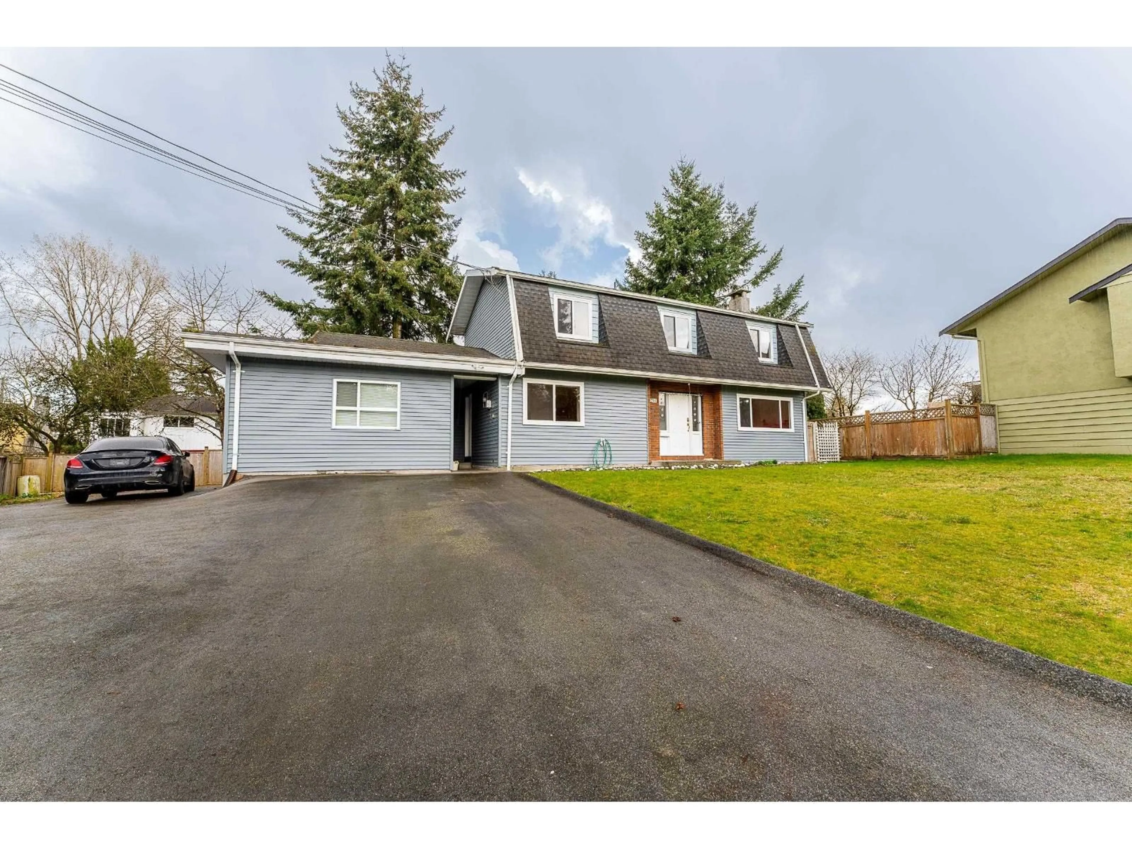 A pic from outside/outdoor area/front of a property/back of a property/a pic from drone, street for 12764 104A AVENUE, Surrey British Columbia V3V6C1