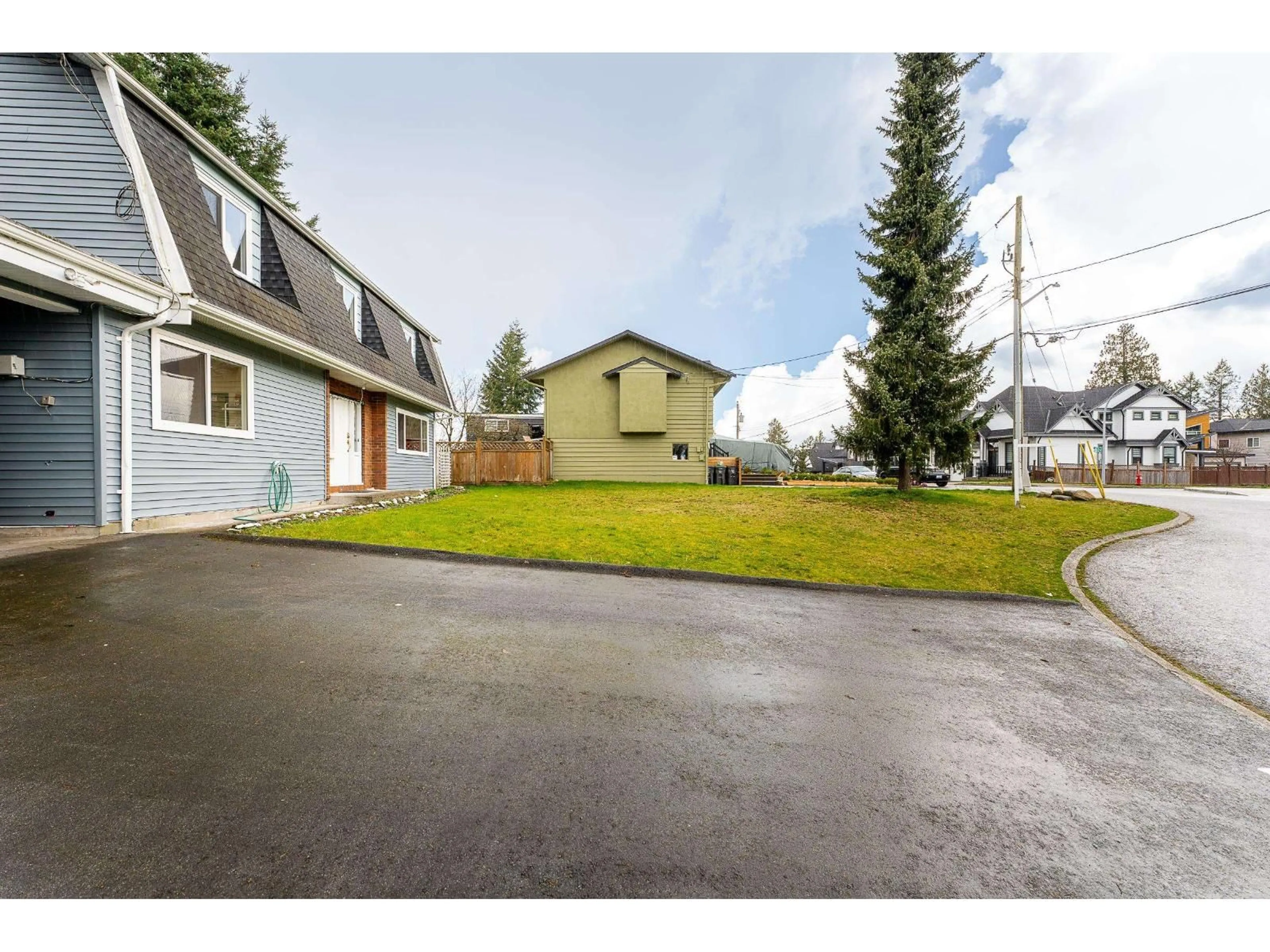 A pic from outside/outdoor area/front of a property/back of a property/a pic from drone, street for 12764 104A AVENUE, Surrey British Columbia V3V6C1