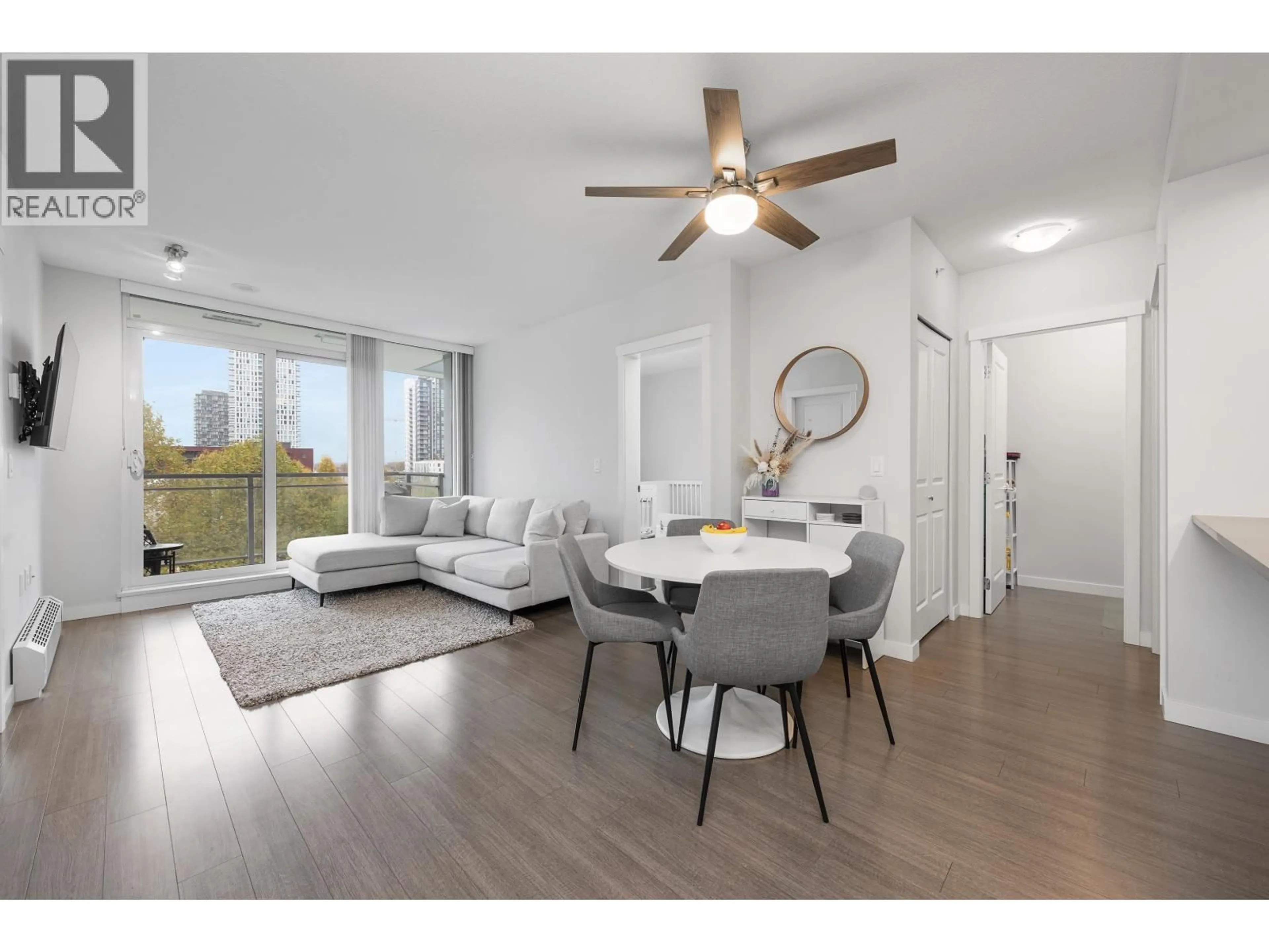 Living room with furniture, wood/laminate floor for 511 - 3281 KENT AVENUE NORTH AVENUE, Vancouver British Columbia V5S0C4