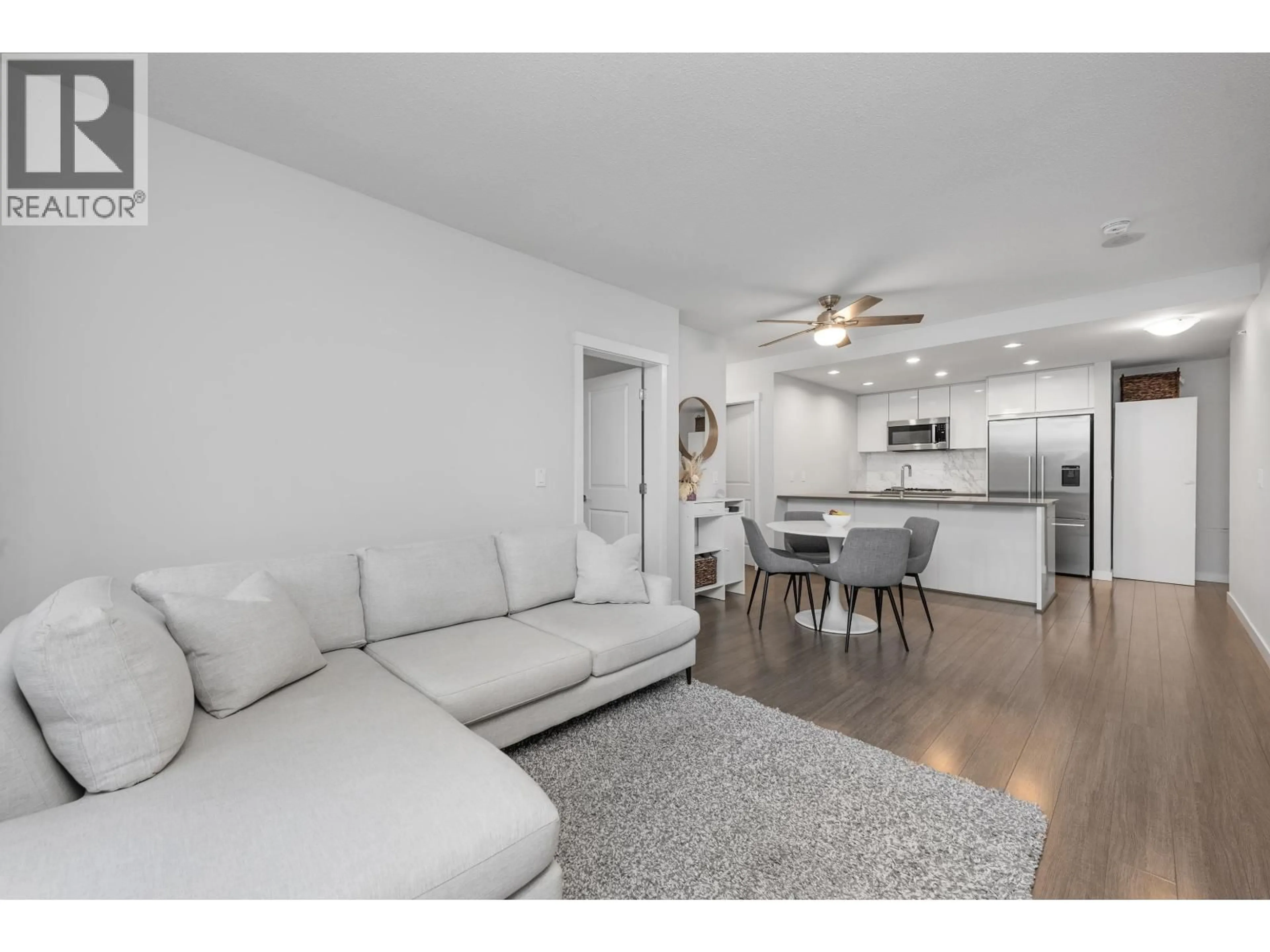 Living room with furniture, wood/laminate floor for 511 - 3281 KENT AVENUE NORTH AVENUE, Vancouver British Columbia V5S0C4