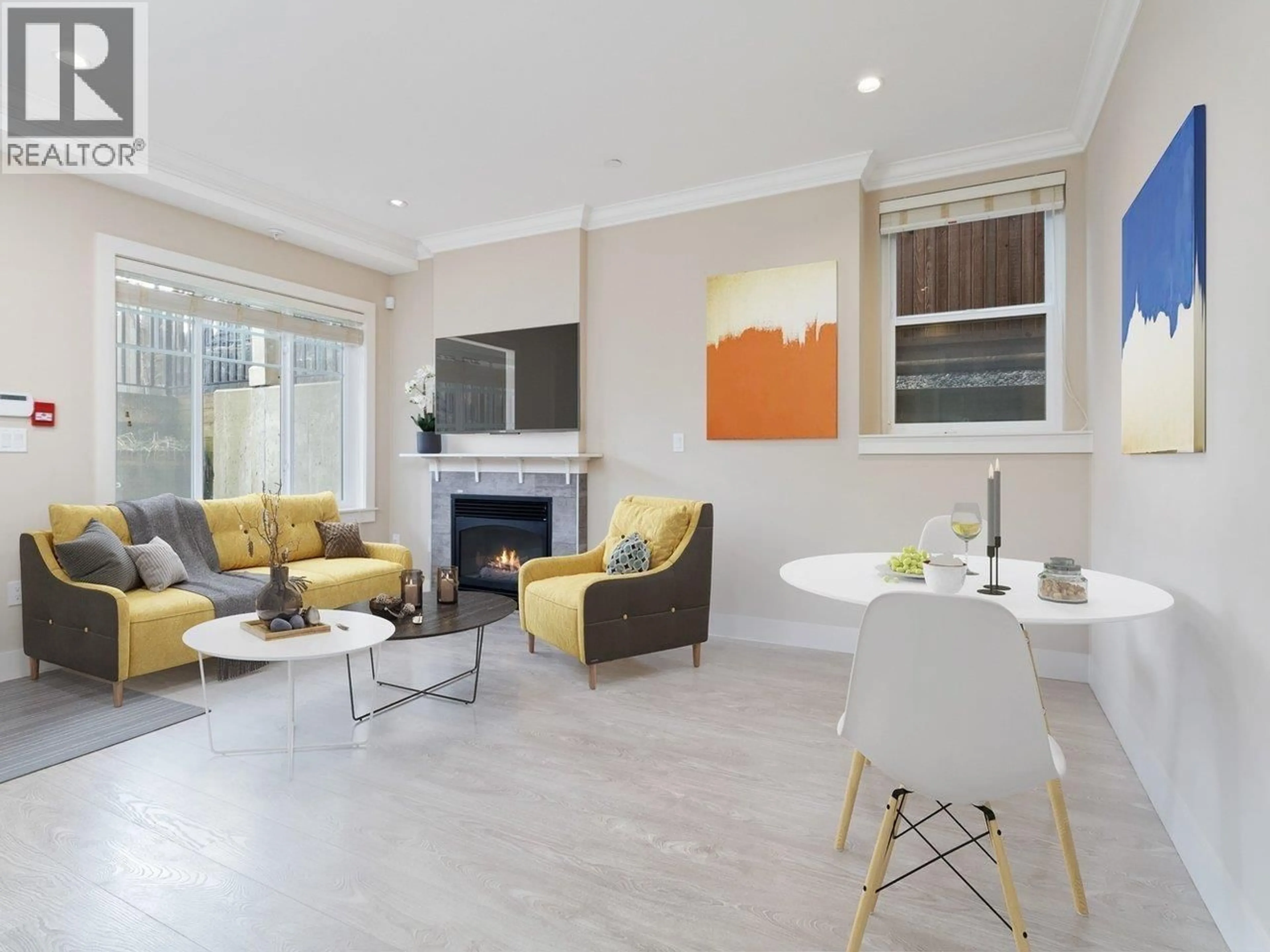 Living room with furniture, unknown for 102 - 4577 SLOCAN STREET, Vancouver British Columbia V5R1Z8