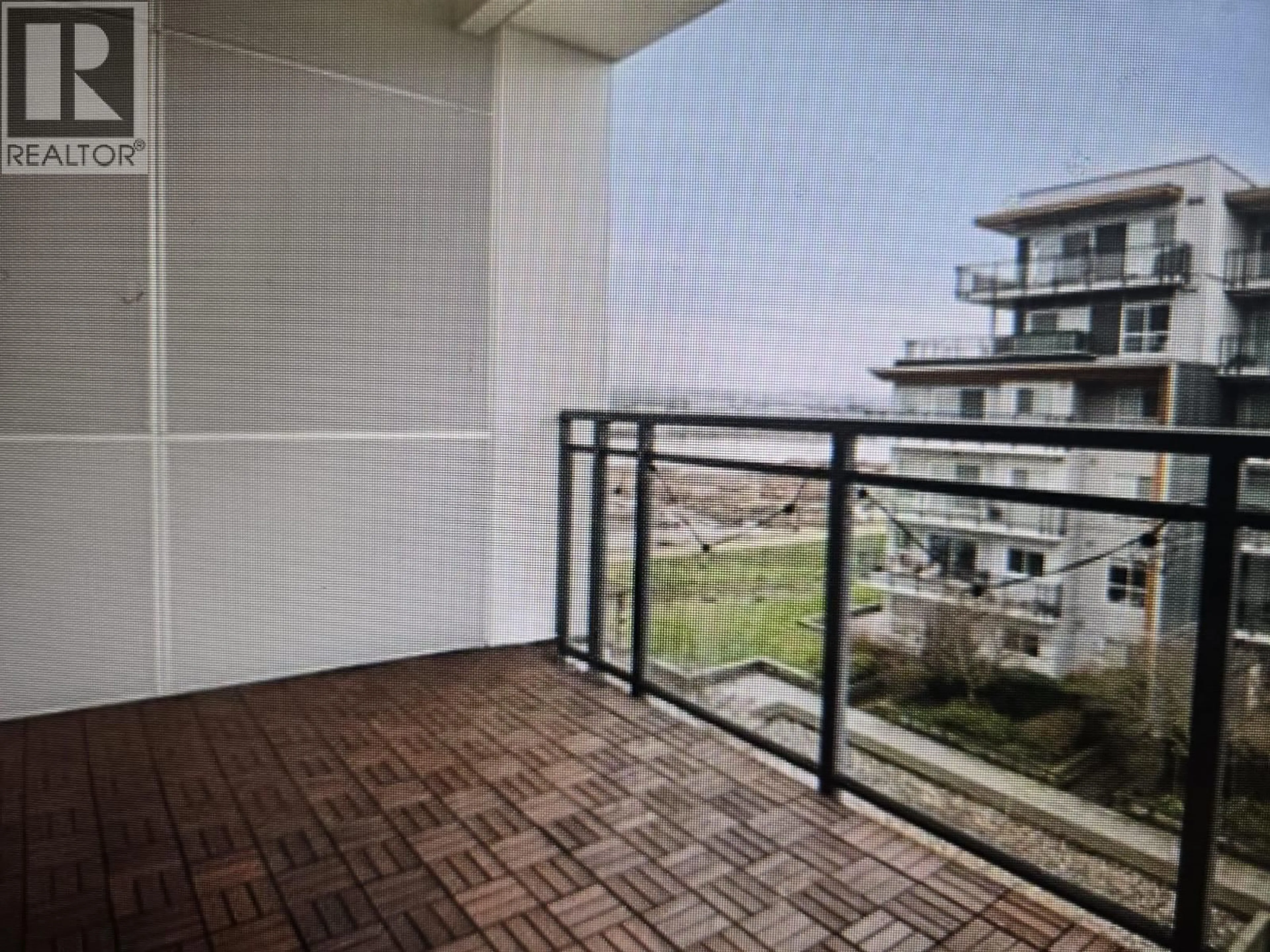 Balcony in the apartment, city buildings view from balcony for 201 - 10033 RIVER DRIVE, Richmond British Columbia V6X0L1