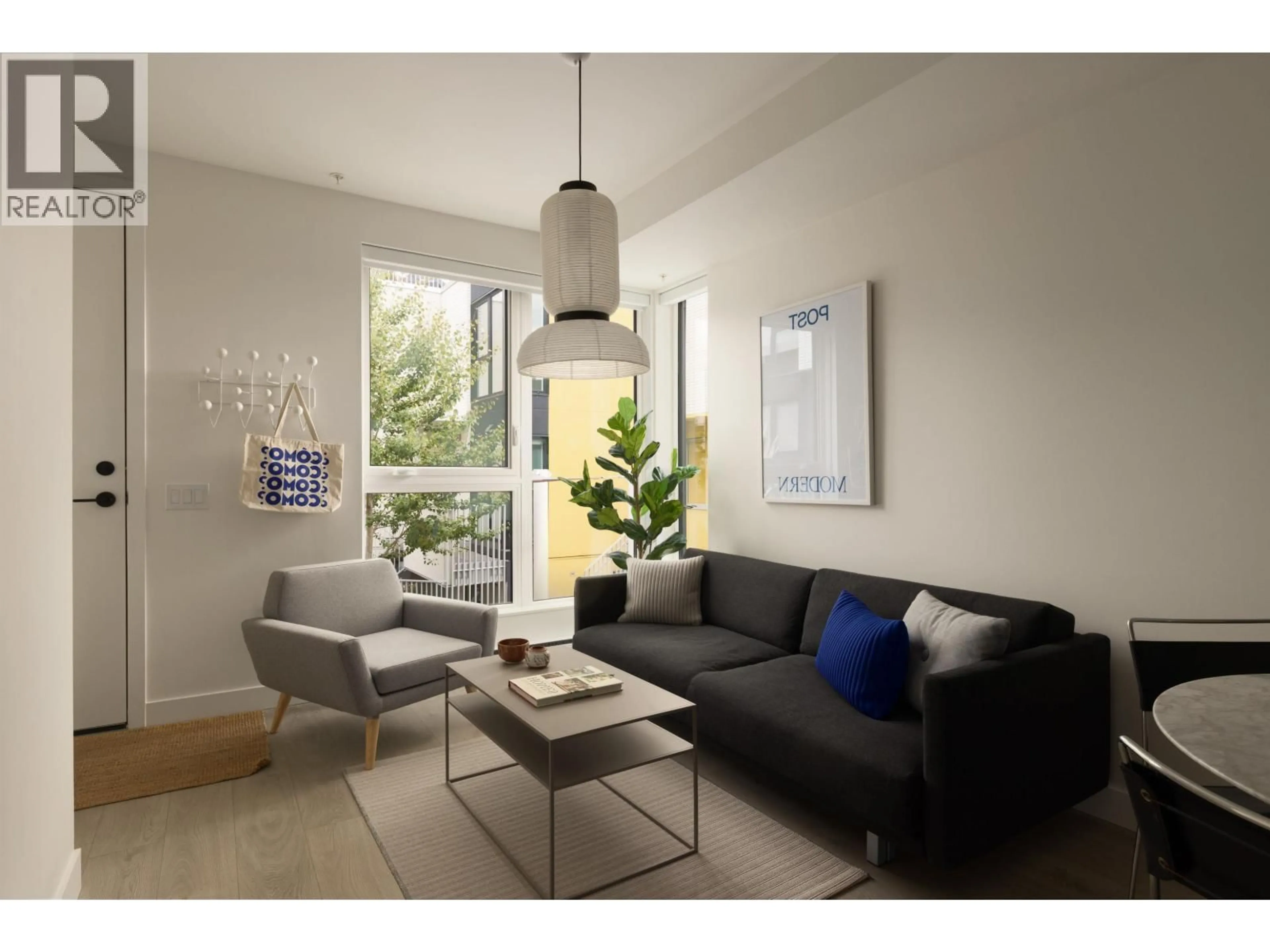 Living room with furniture, unknown for 215 - 322 15TH AVENUE, Vancouver British Columbia V5T0K5