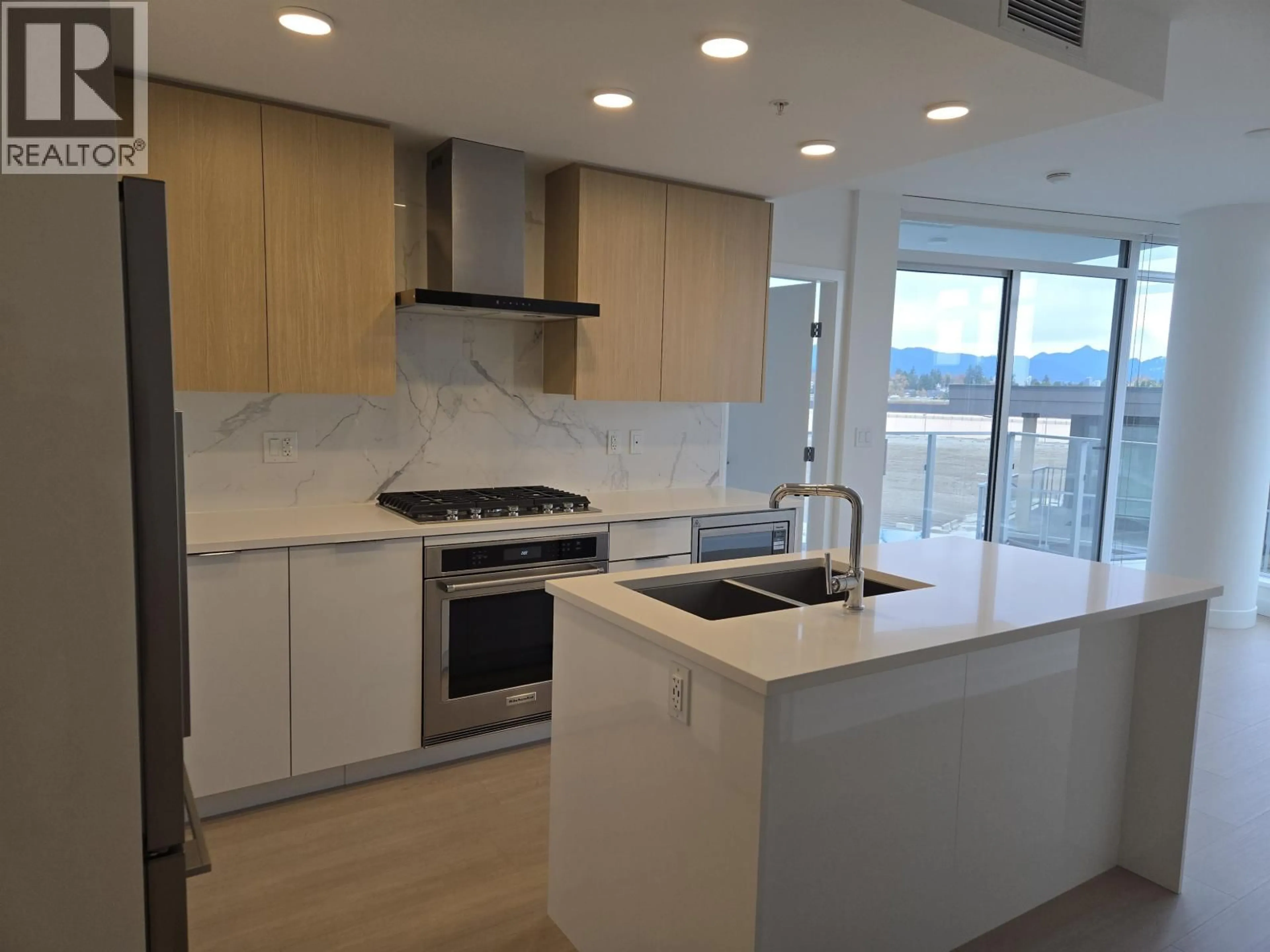 Open concept kitchen, unknown for 407 - 7769 PARK CRESCENT, Burnaby British Columbia V3N0J7