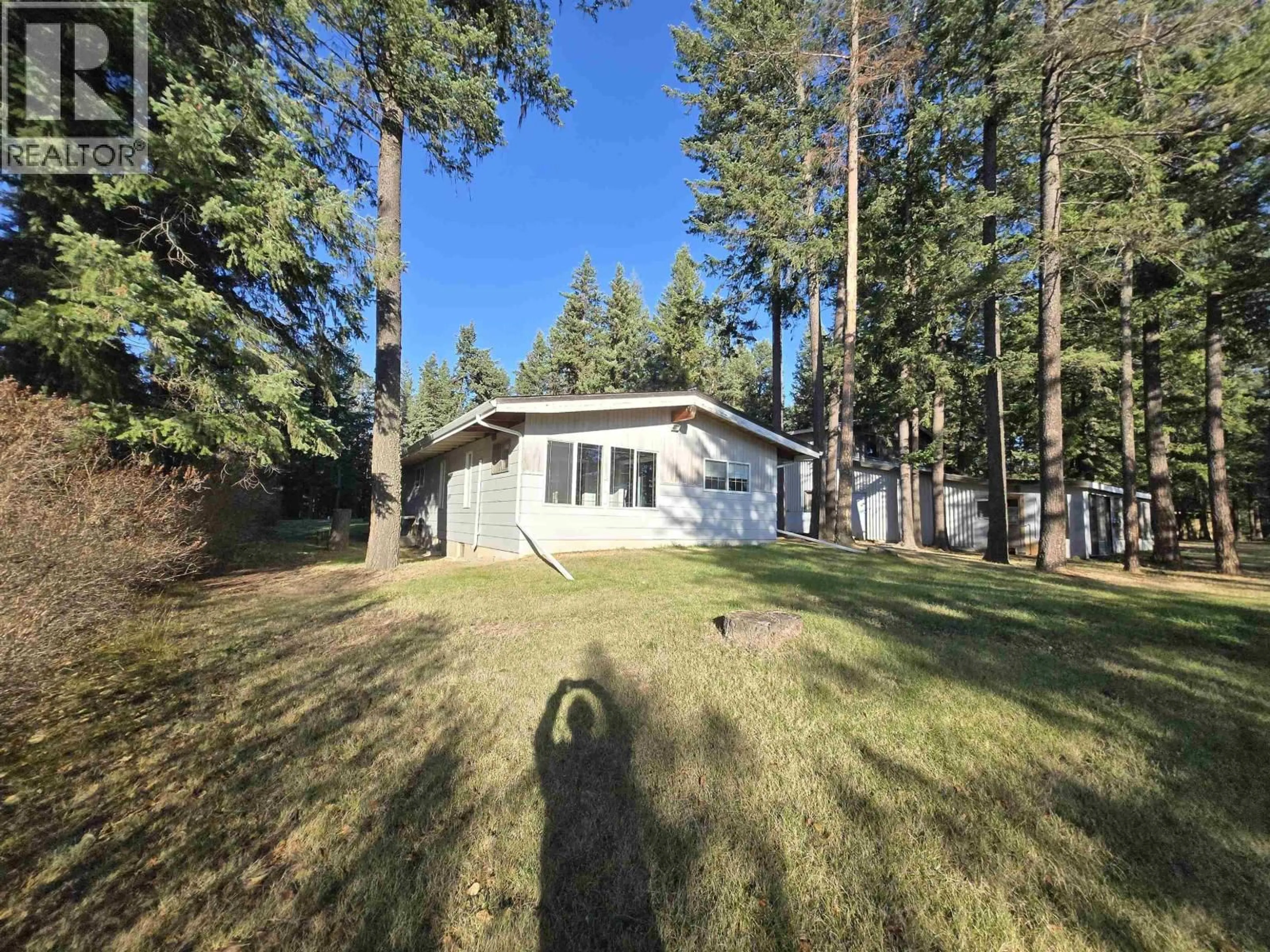 A pic from outside/outdoor area/front of a property/back of a property/a pic from drone, forest/trees view for 706 CALLIS ROAD, Quesnel British Columbia V2J6S3