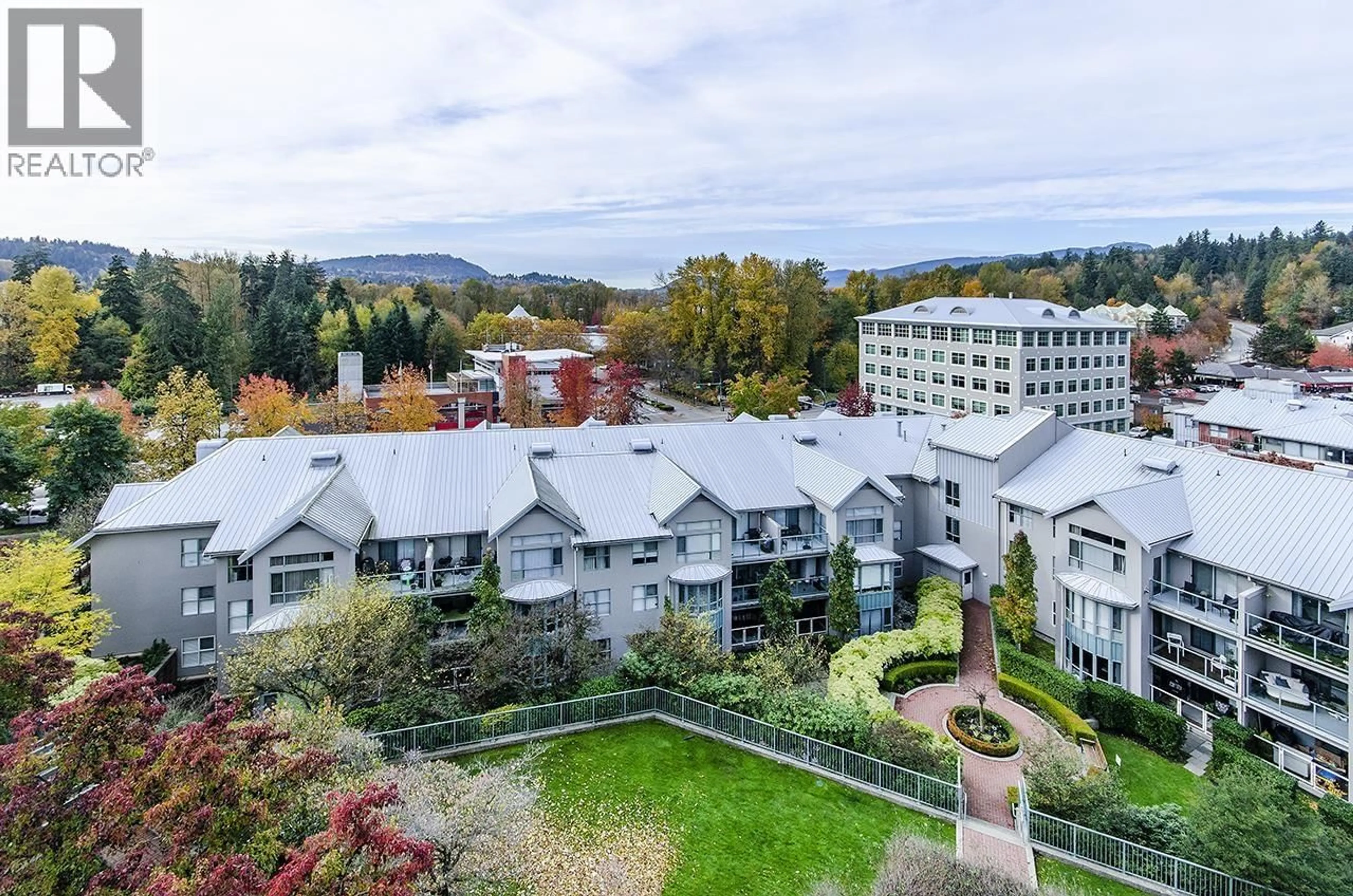 A pic from outside/outdoor area/front of a property/back of a property/a pic from drone, unknown for 701 - 235 GUILDFORD WAY, Port Moody British Columbia V3H5L8