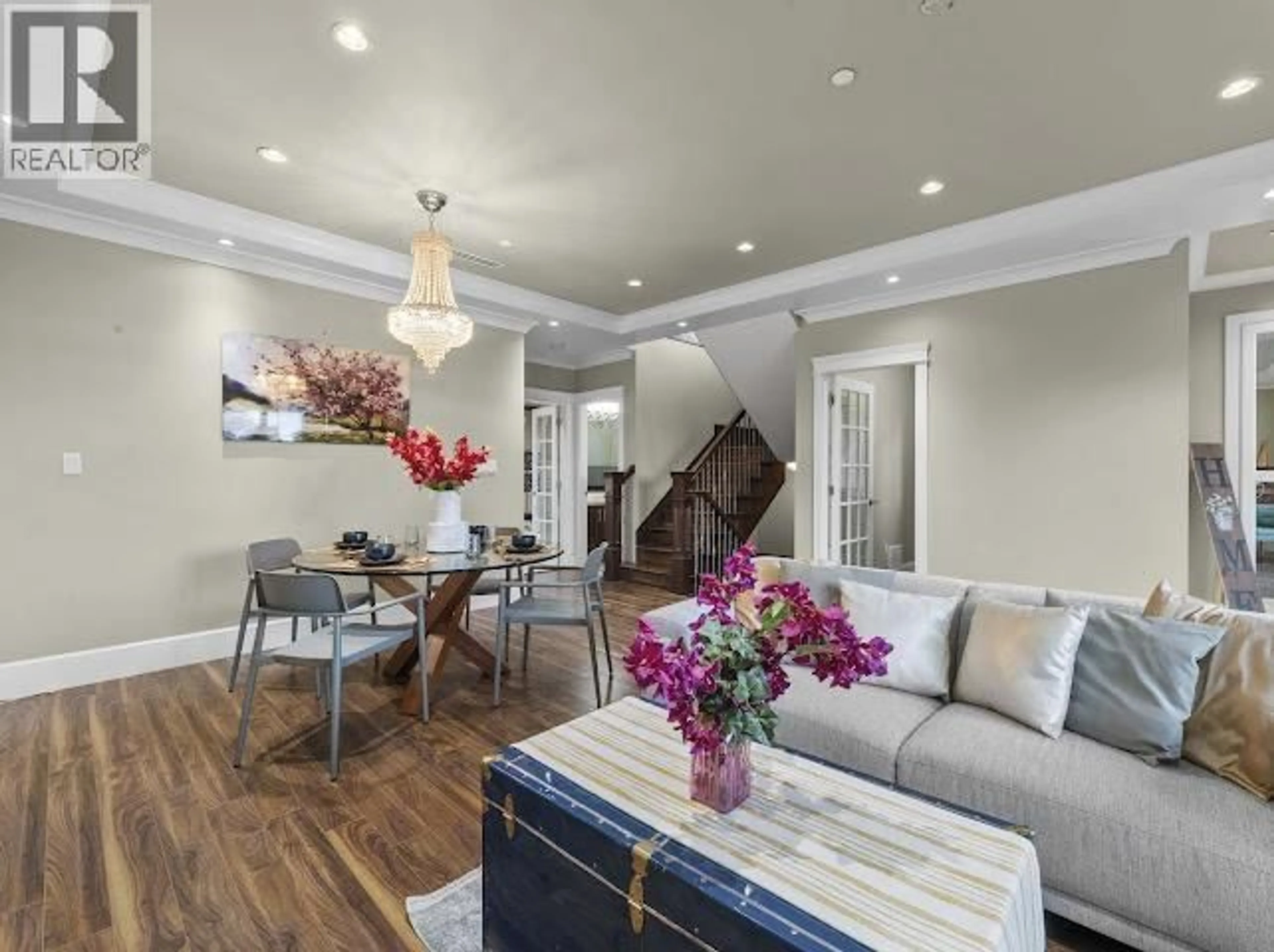 Living room with furniture, wood/laminate floor for 455 60TH AVENUE, Vancouver British Columbia V5X2A1