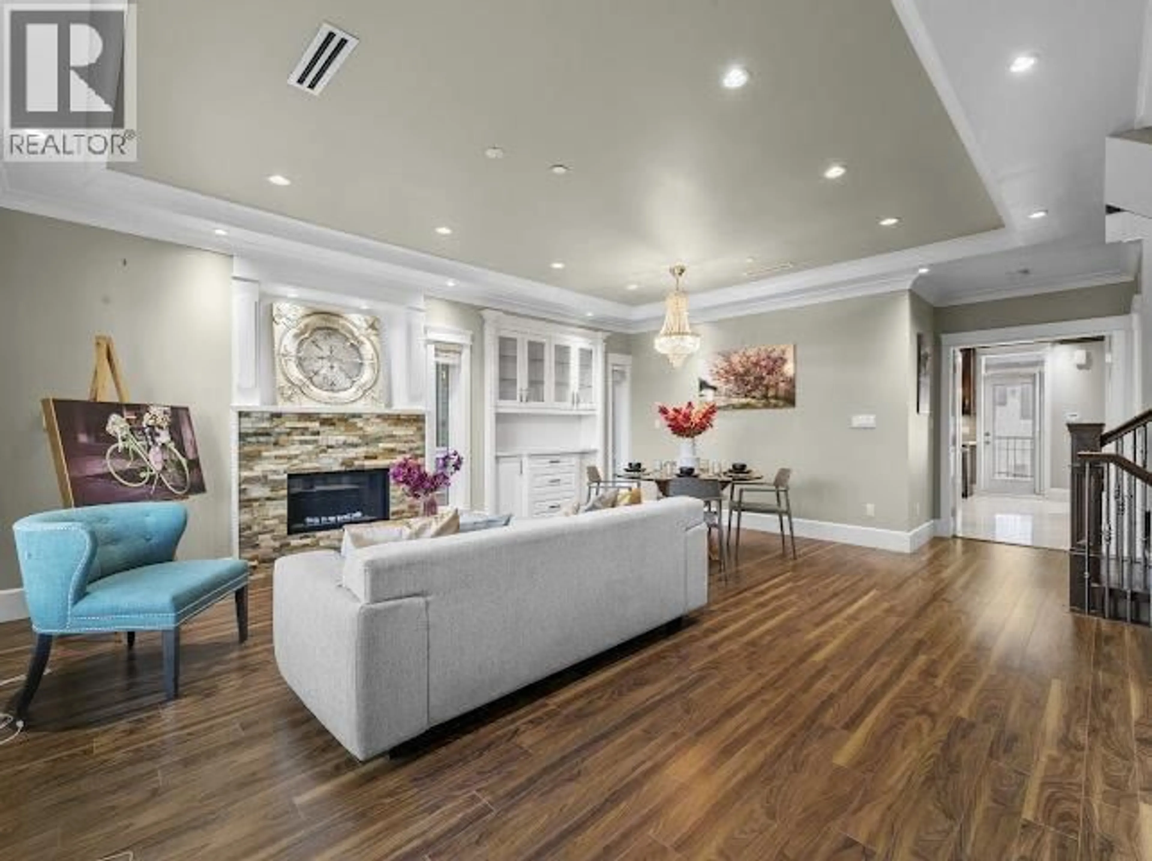 Living room with furniture, wood/laminate floor for 455 60TH AVENUE, Vancouver British Columbia V5X2A1