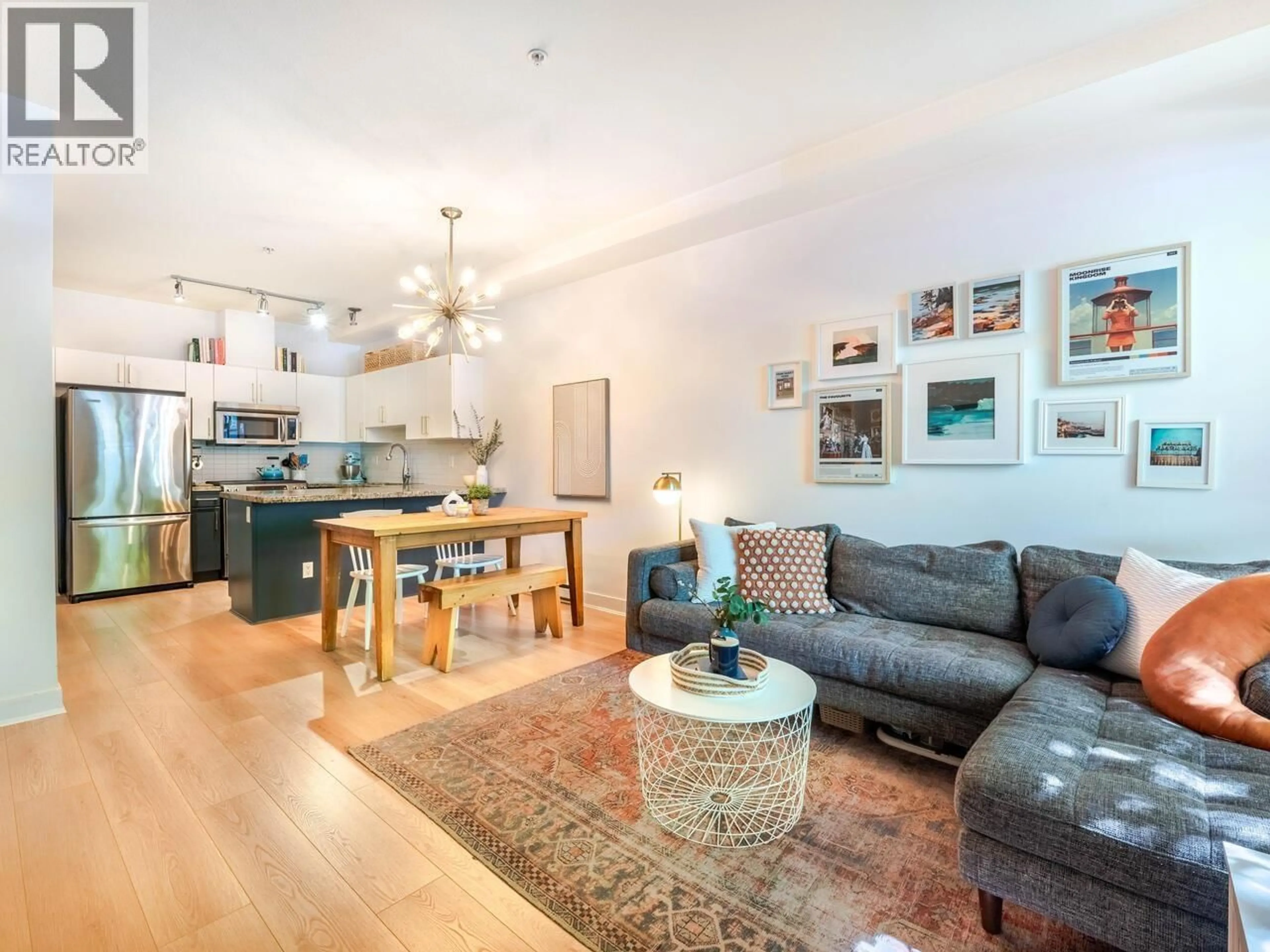 Living room with furniture, wood/laminate floor for 1871 STAINSBURY AVENUE, Vancouver British Columbia V5N2M6