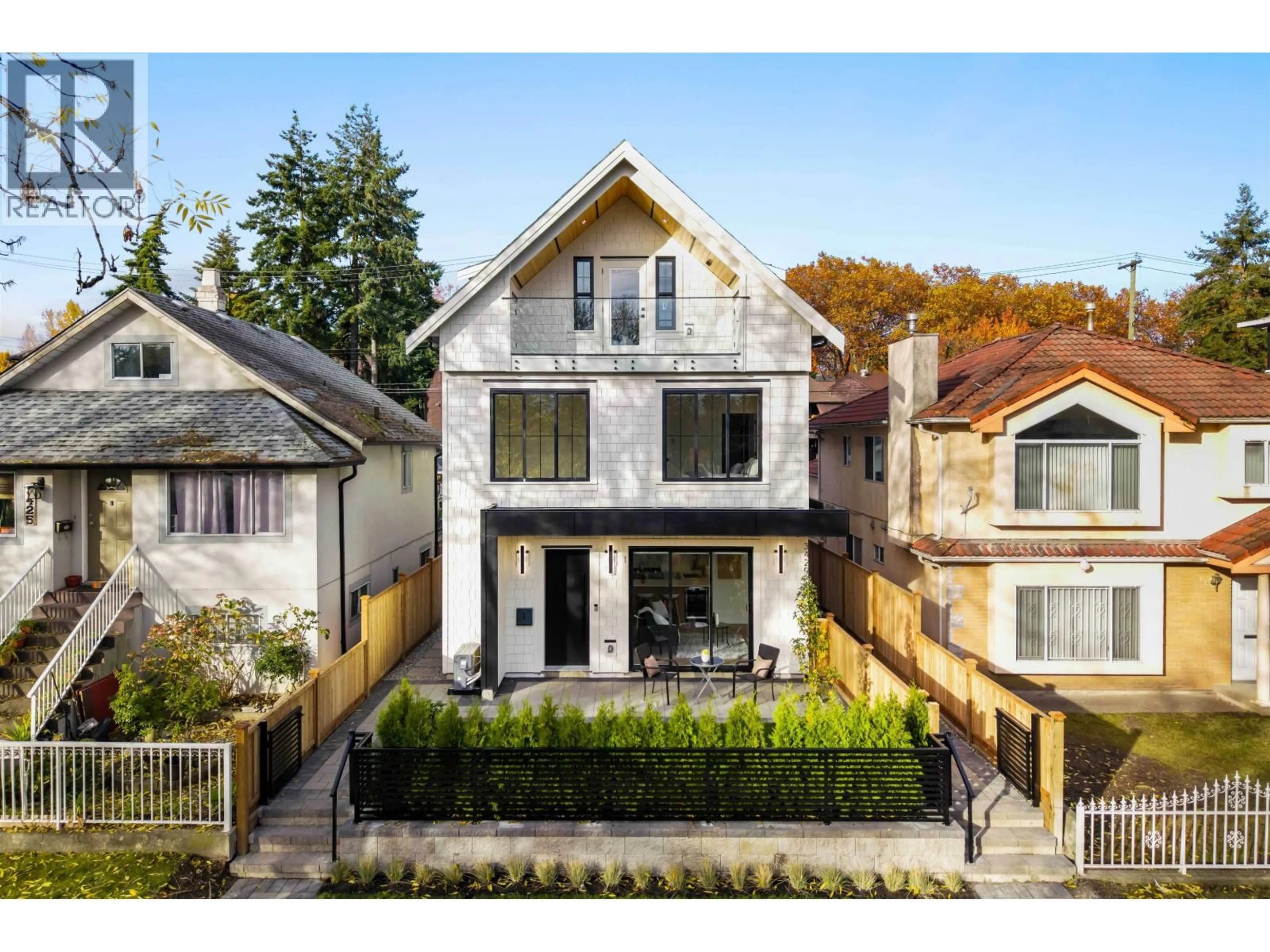 Home with brick exterior material, street for 1 - 3429 NAPIER STREET, Vancouver British Columbia V5K2X5