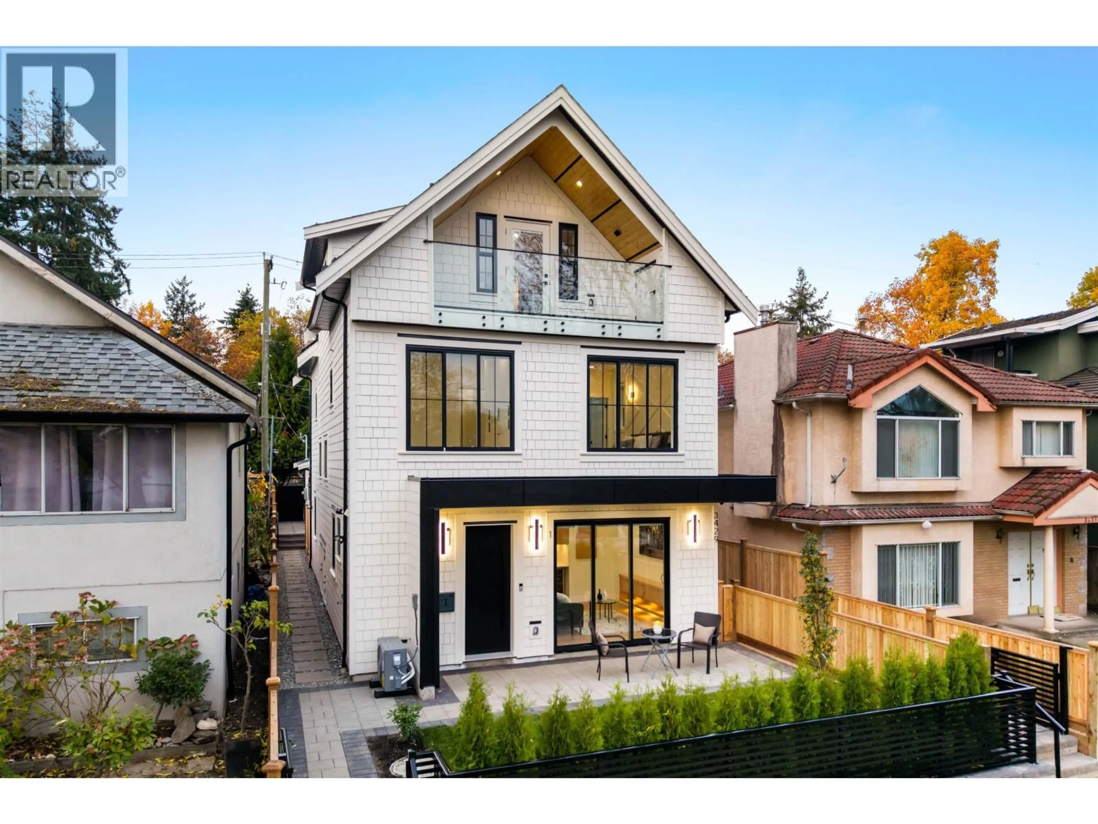 Home with brick exterior material, street for 1 - 3429 NAPIER STREET, Vancouver British Columbia V5K2X5