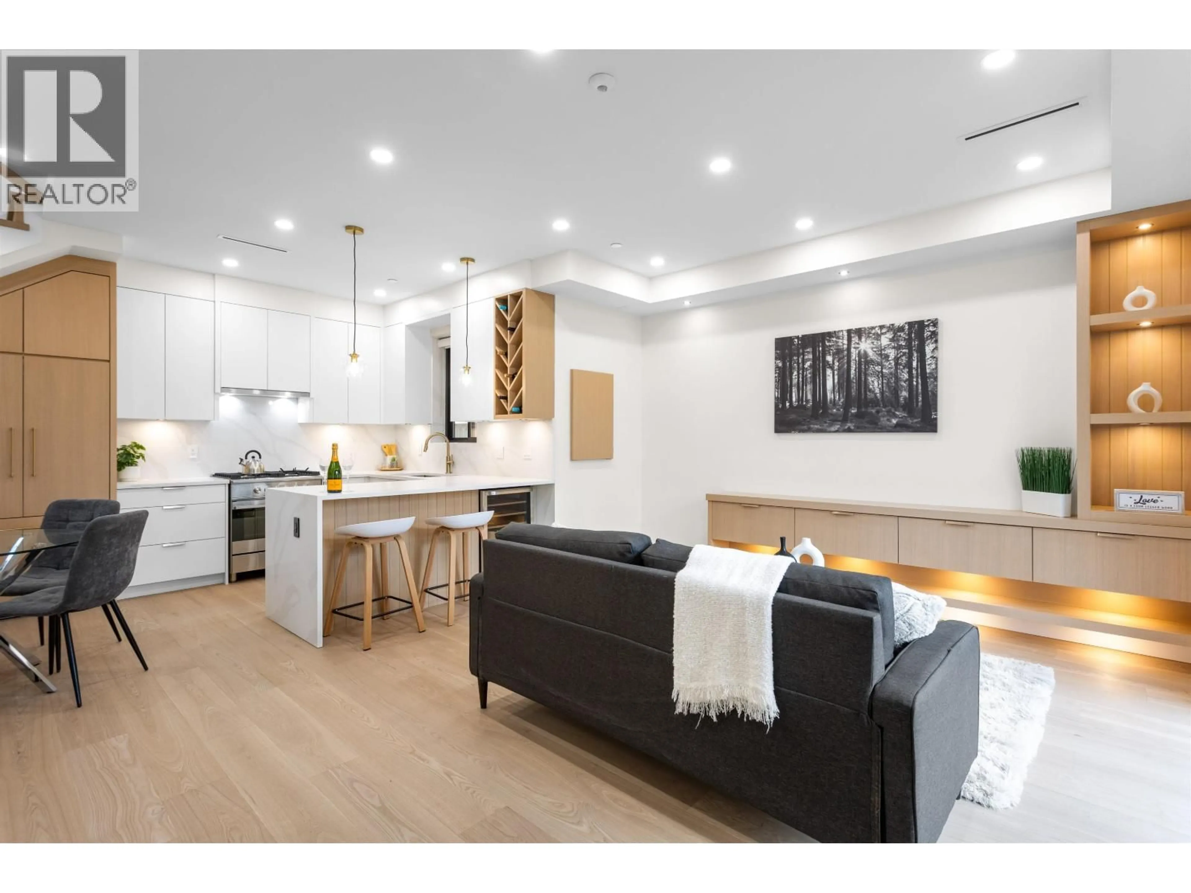 Open concept kitchen, wood/laminate floor for 1 - 3429 NAPIER STREET, Vancouver British Columbia V5K2X5