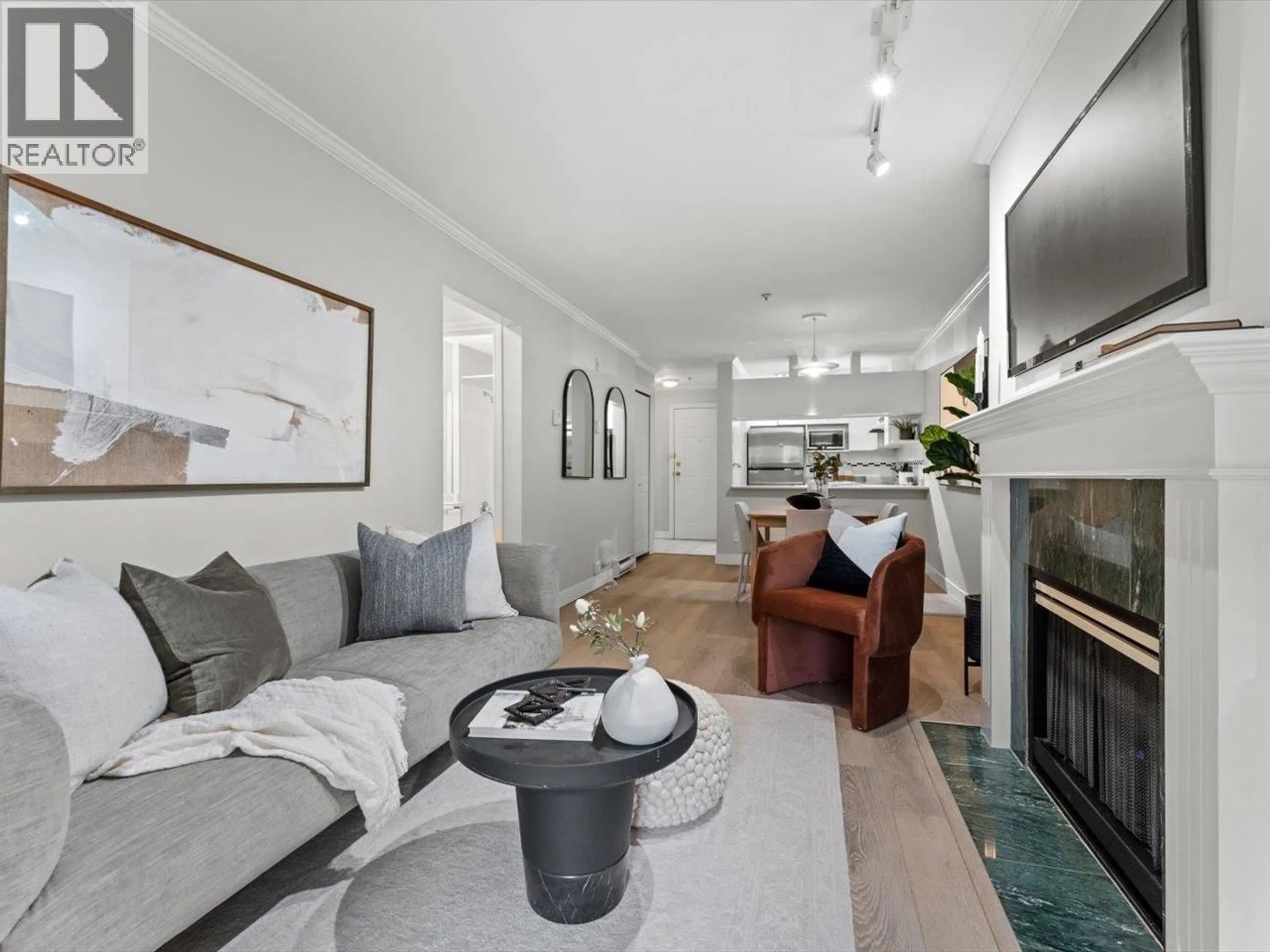 Living room with furniture, unknown for 205 - 3638 BROADWAY, Vancouver British Columbia V6R2B7