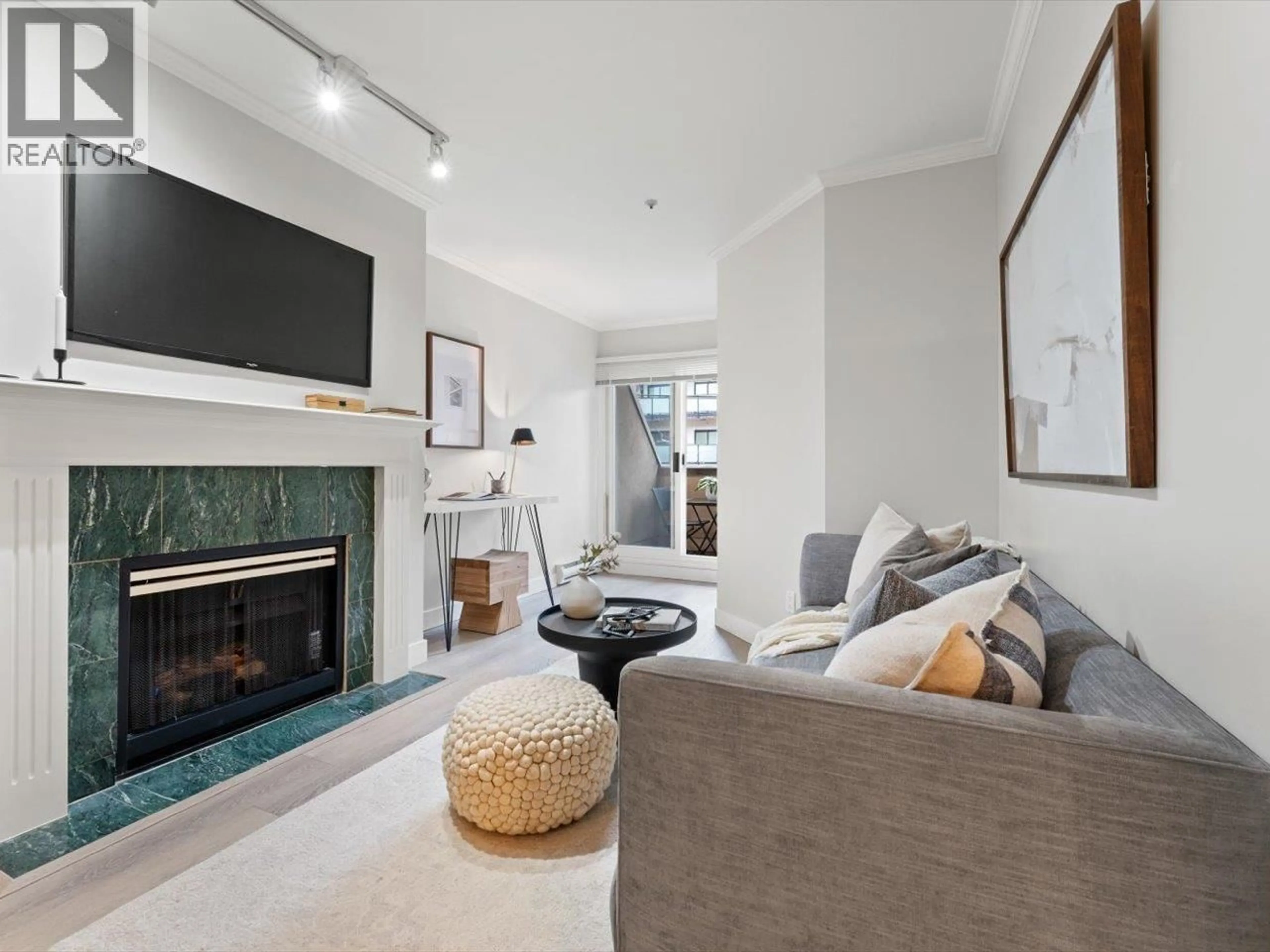 Living room with furniture, unknown for 205 - 3638 BROADWAY, Vancouver British Columbia V6R2B7