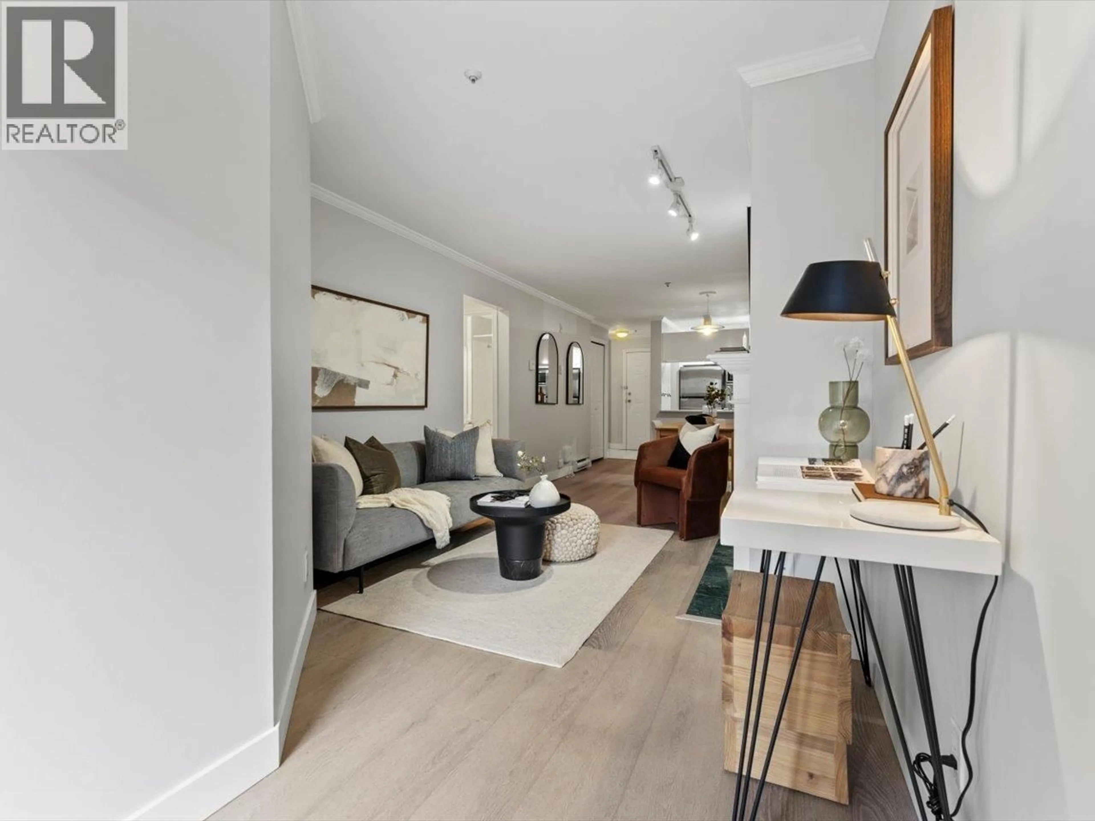 Living room with furniture, unknown for 205 - 3638 BROADWAY, Vancouver British Columbia V6R2B7