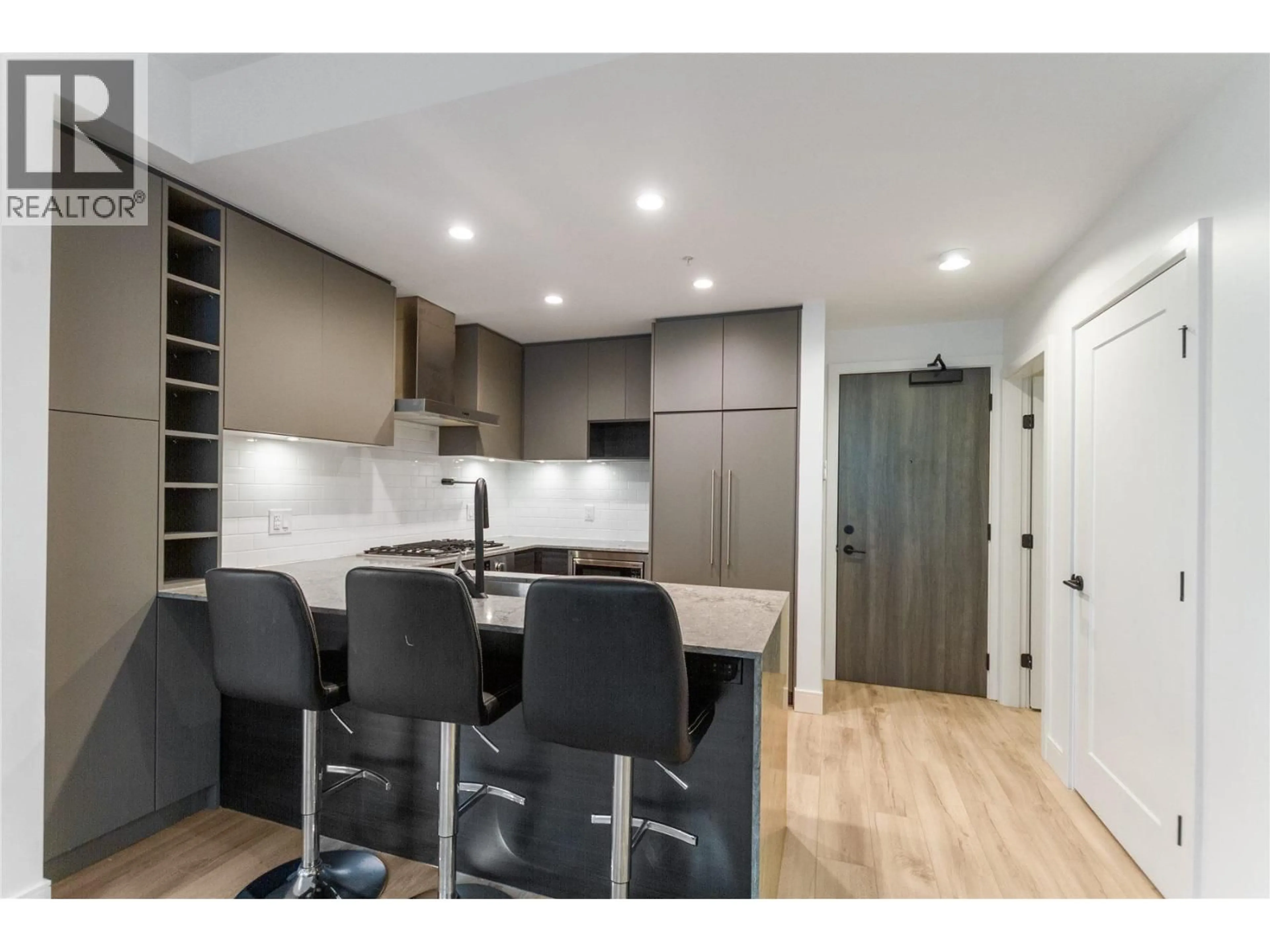 Open concept kitchen, wood/laminate floor for 202 - 3131 MURRAY STREET, Port Moody British Columbia V3H0L9