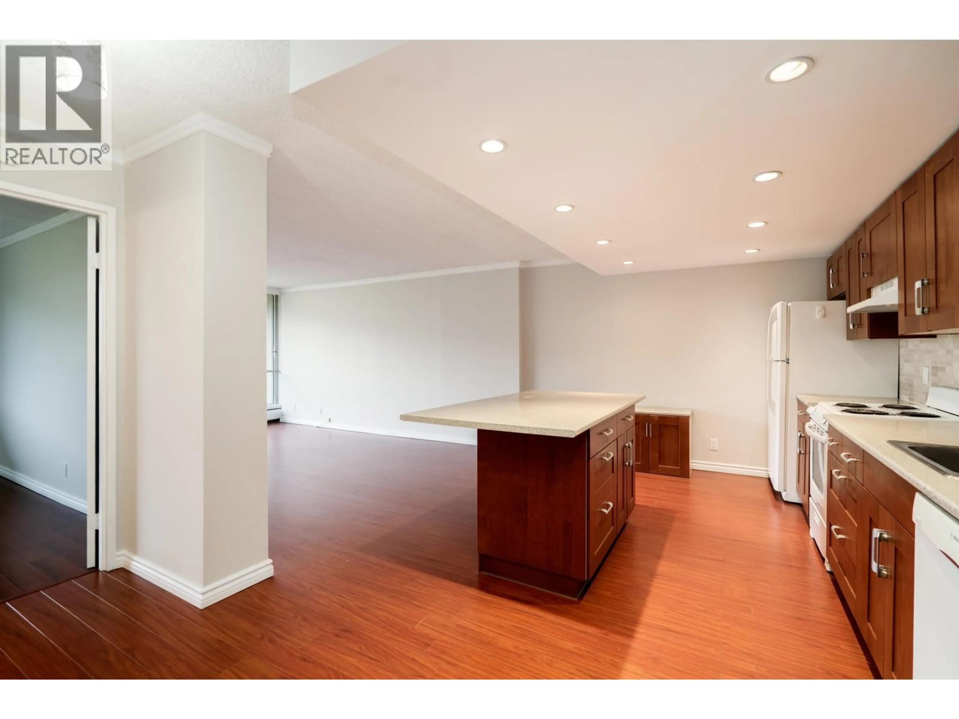 Open concept kitchen, wood/laminate floor for 1319 - 2012 FULLERTON AVENUE, North Vancouver British Columbia V7P3E3