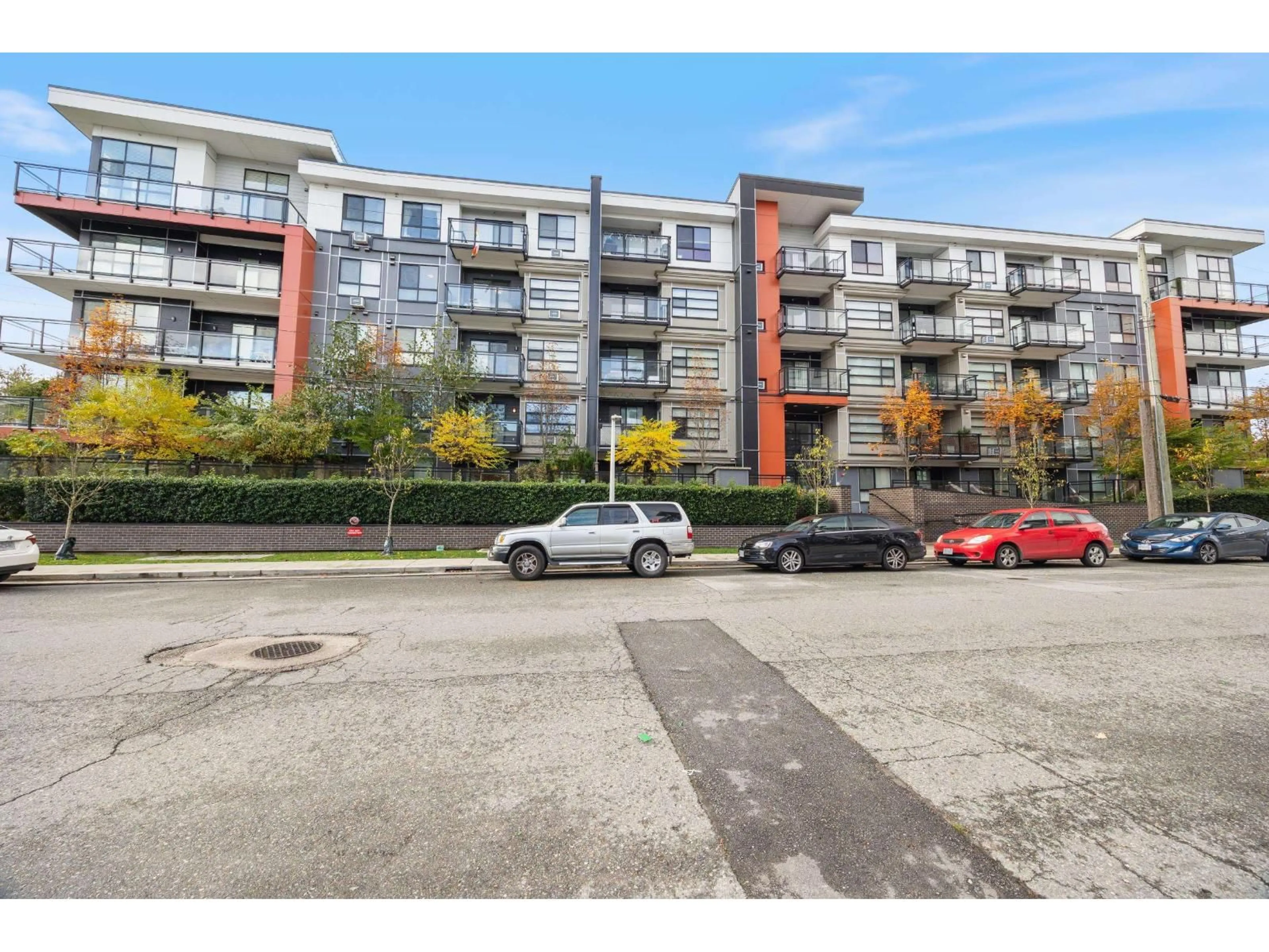 A pic from outside/outdoor area/front of a property/back of a property/a pic from drone, street for 208 - 5485 BRYDON, Langley British Columbia V3A0N5