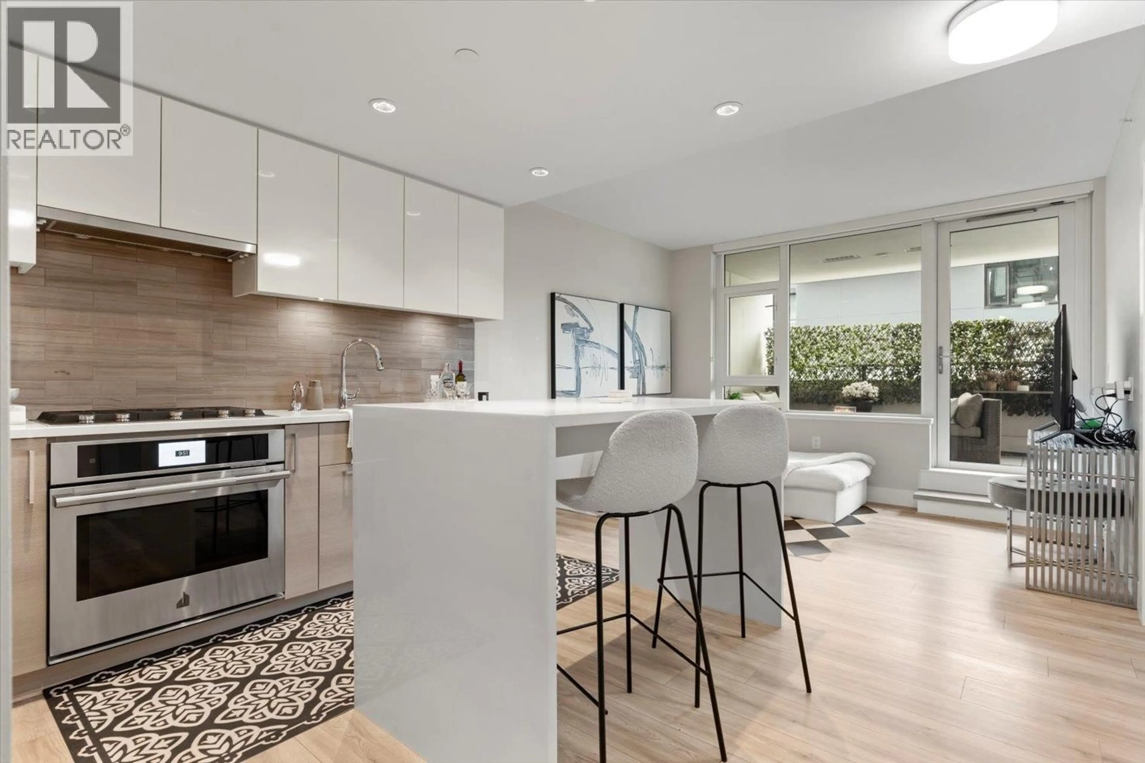 Open concept kitchen, ceramic/tile floor for 508 - 8533 RIVER DISTRICT CROSSING, Vancouver British Columbia V5S0H2