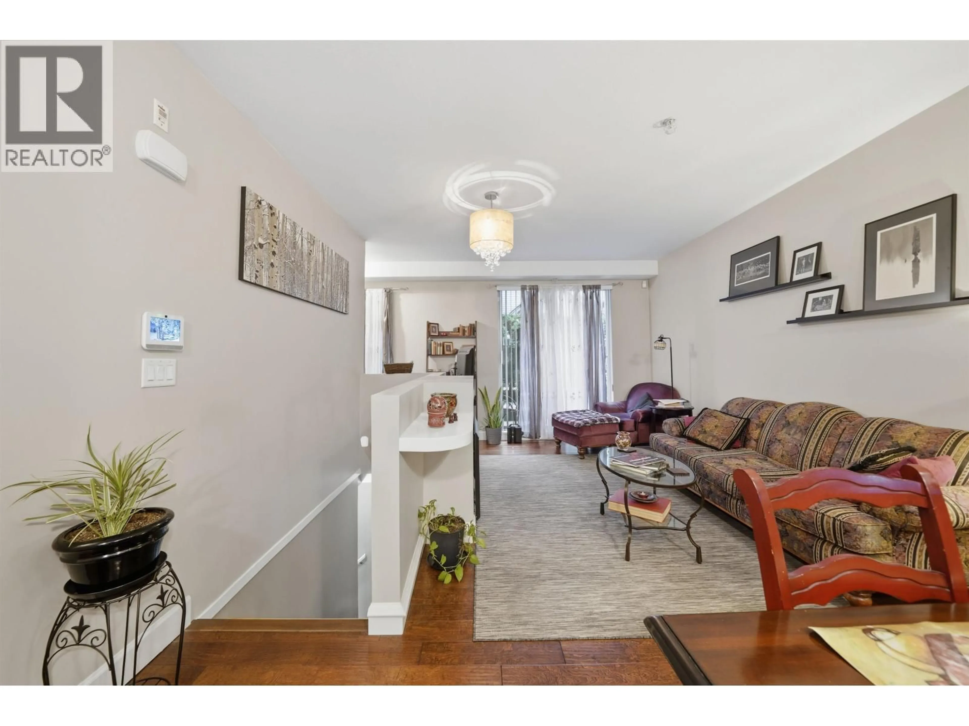 Living room with furniture, unknown for 117 - 2108 ROWLAND STREET, Port Coquitlam British Columbia V3C0C1