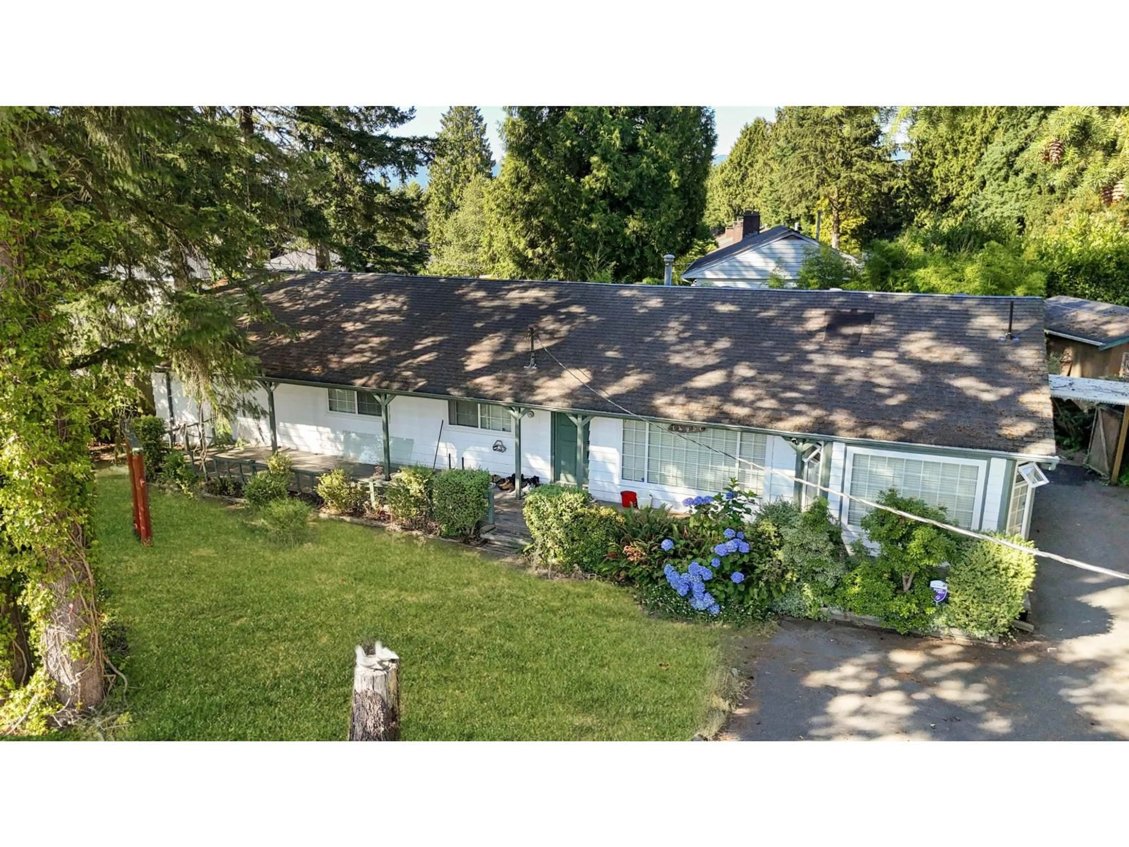A pic from outside/outdoor area/front of a property/back of a property/a pic from drone, unknown for 14957 KEW DR, Surrey British Columbia V3R4Y1