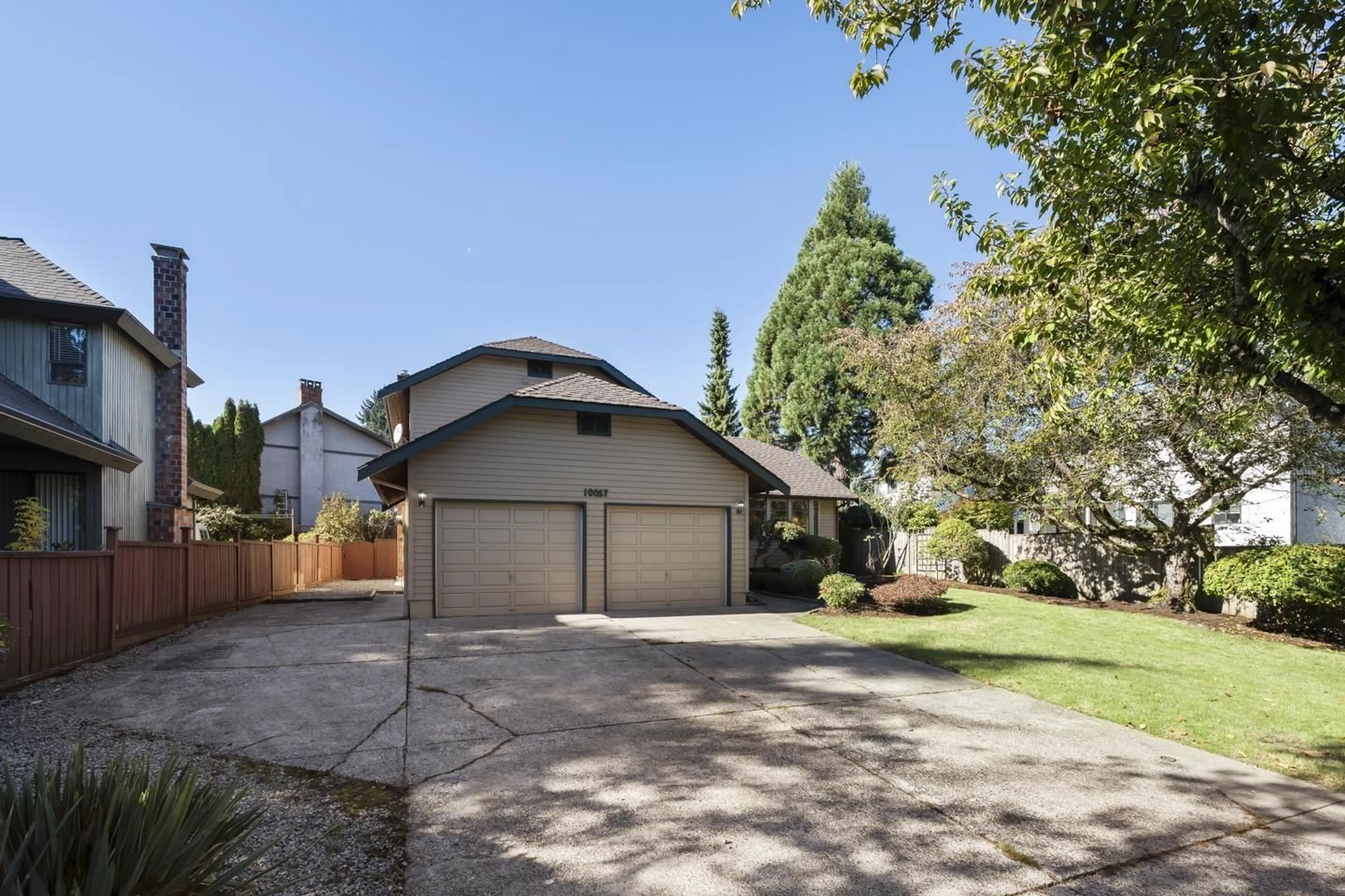 A pic from outside/outdoor area/front of a property/back of a property/a pic from drone, street for 10057 157, Surrey British Columbia V4N2R9