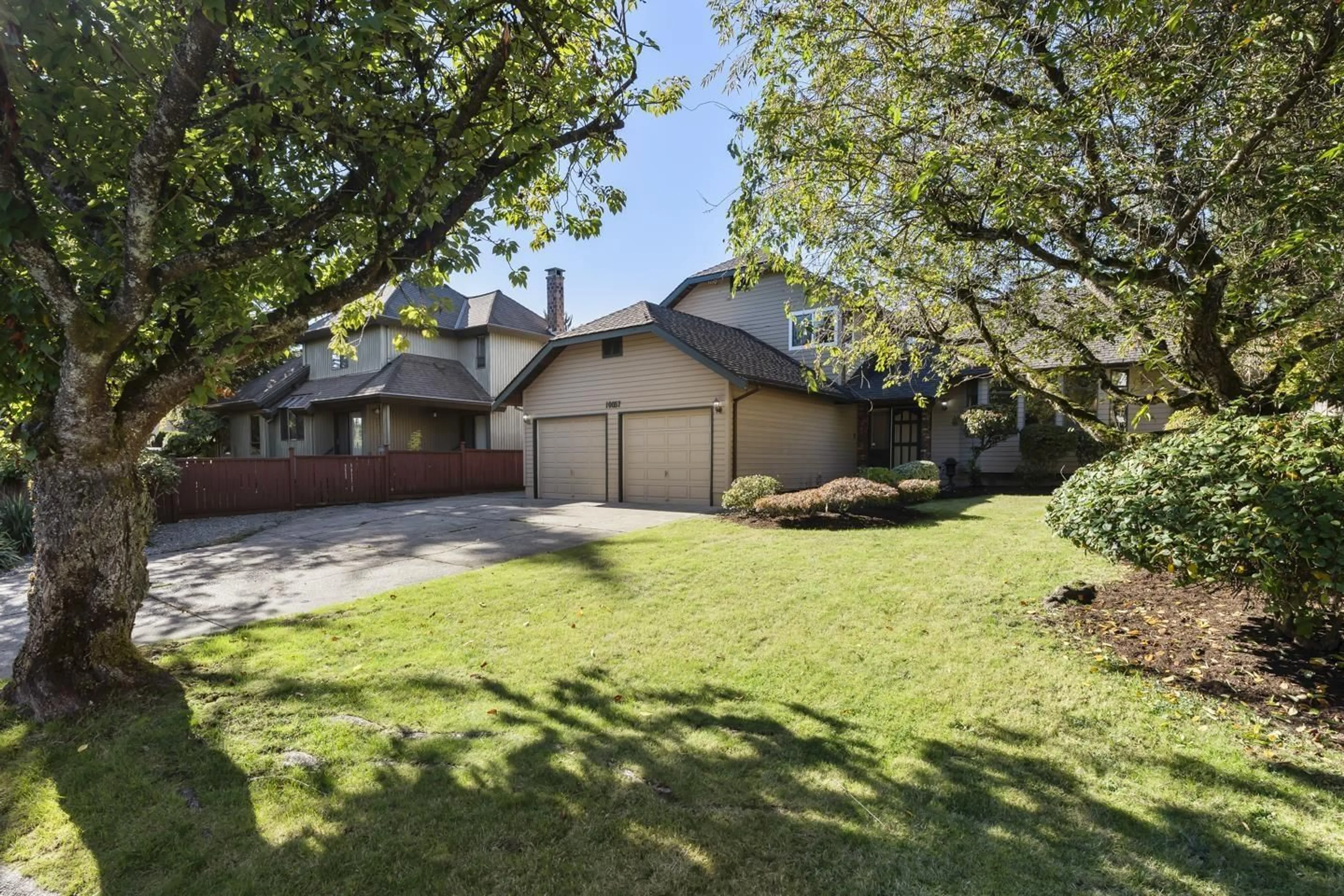 A pic from outside/outdoor area/front of a property/back of a property/a pic from drone, street for 10057 157, Surrey British Columbia V4N2R9