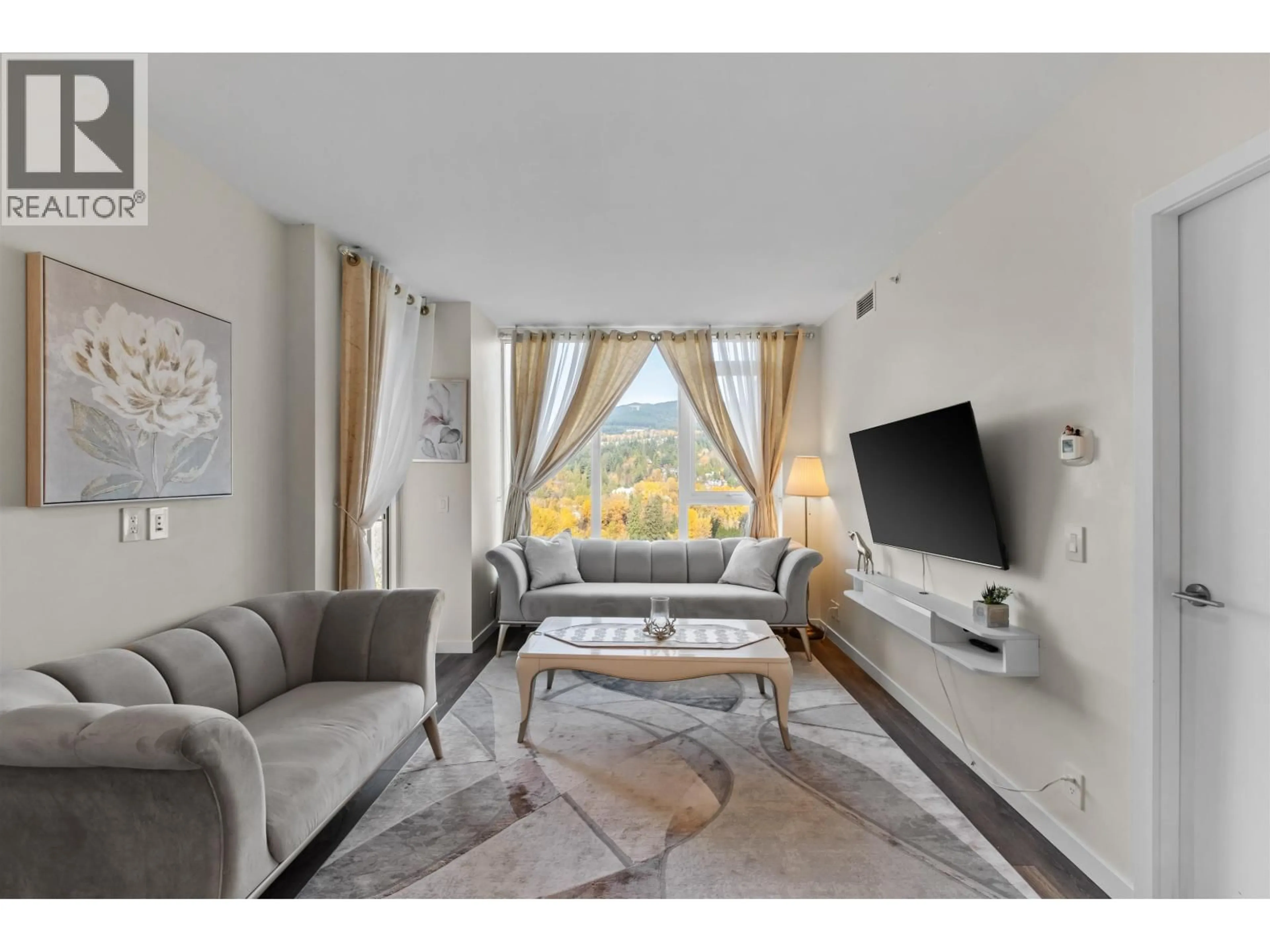 Living room with furniture, unknown for 1601 - 305 MORRISSEY ROAD, Port Moody British Columbia V3H0M3