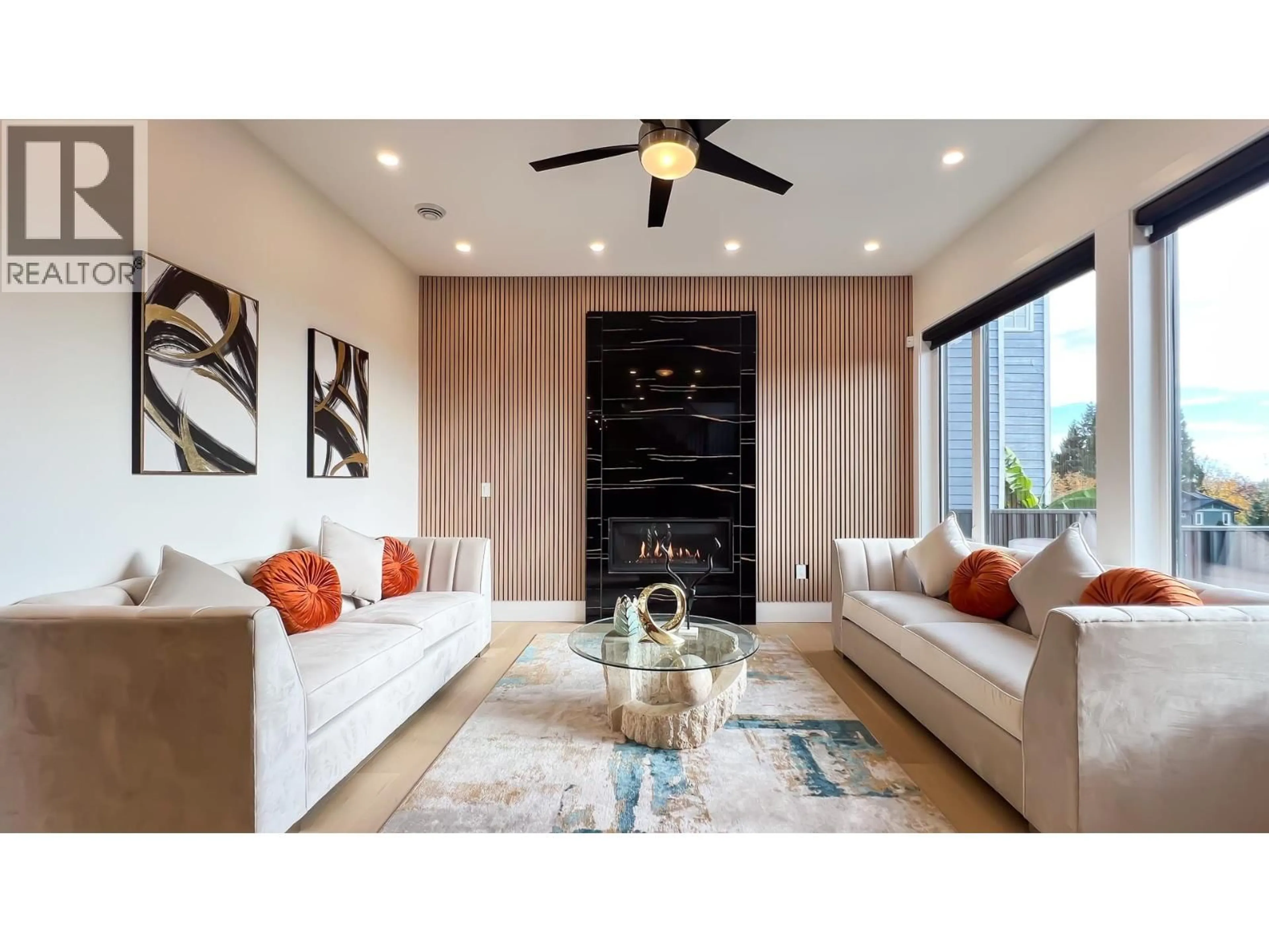 Living room with furniture, wood/laminate floor for 4479 CARSON STREET, Burnaby British Columbia V5J2Y3