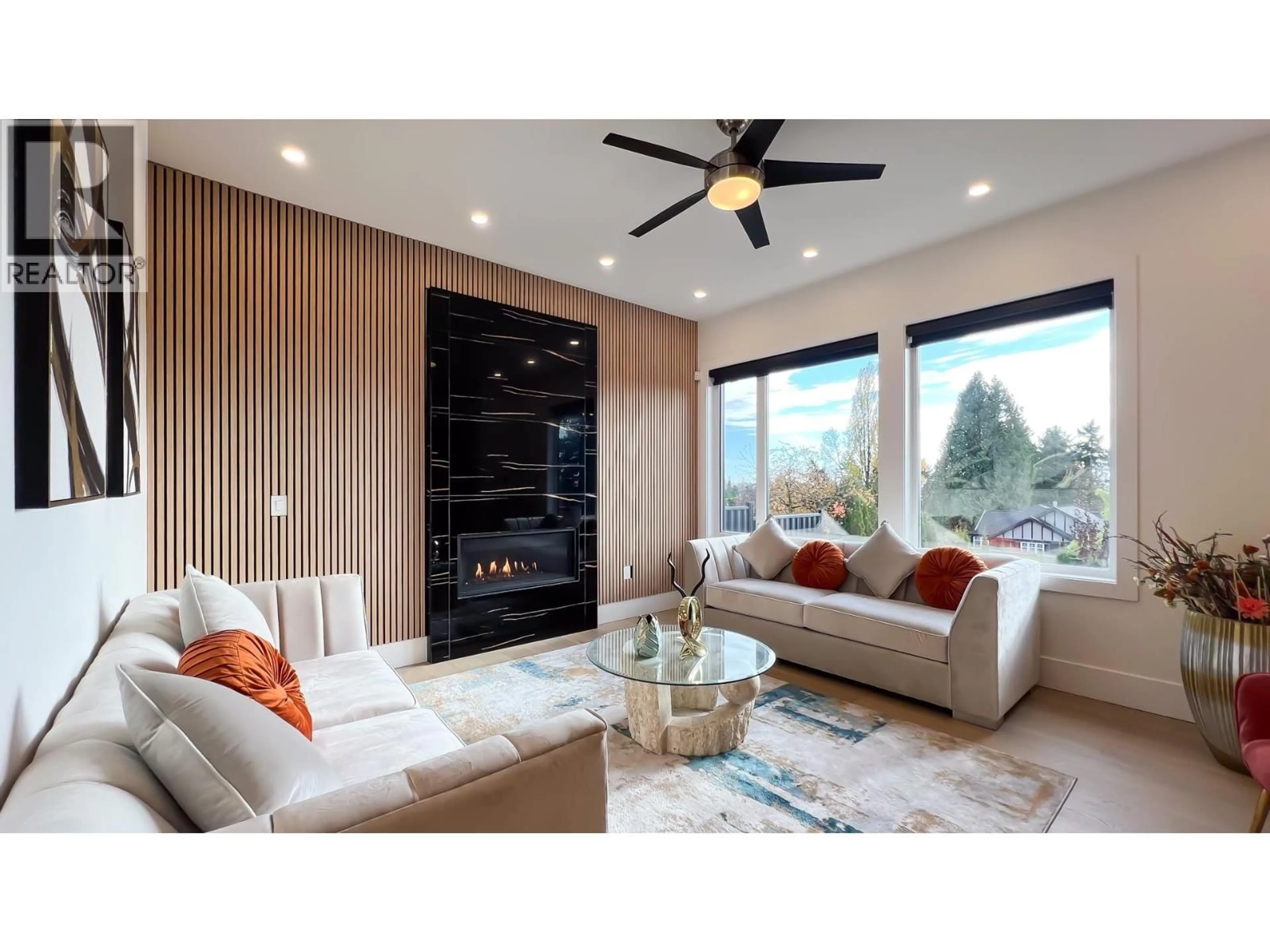 Living room with furniture, wood/laminate floor for 4479 CARSON STREET, Burnaby British Columbia V5J2Y3