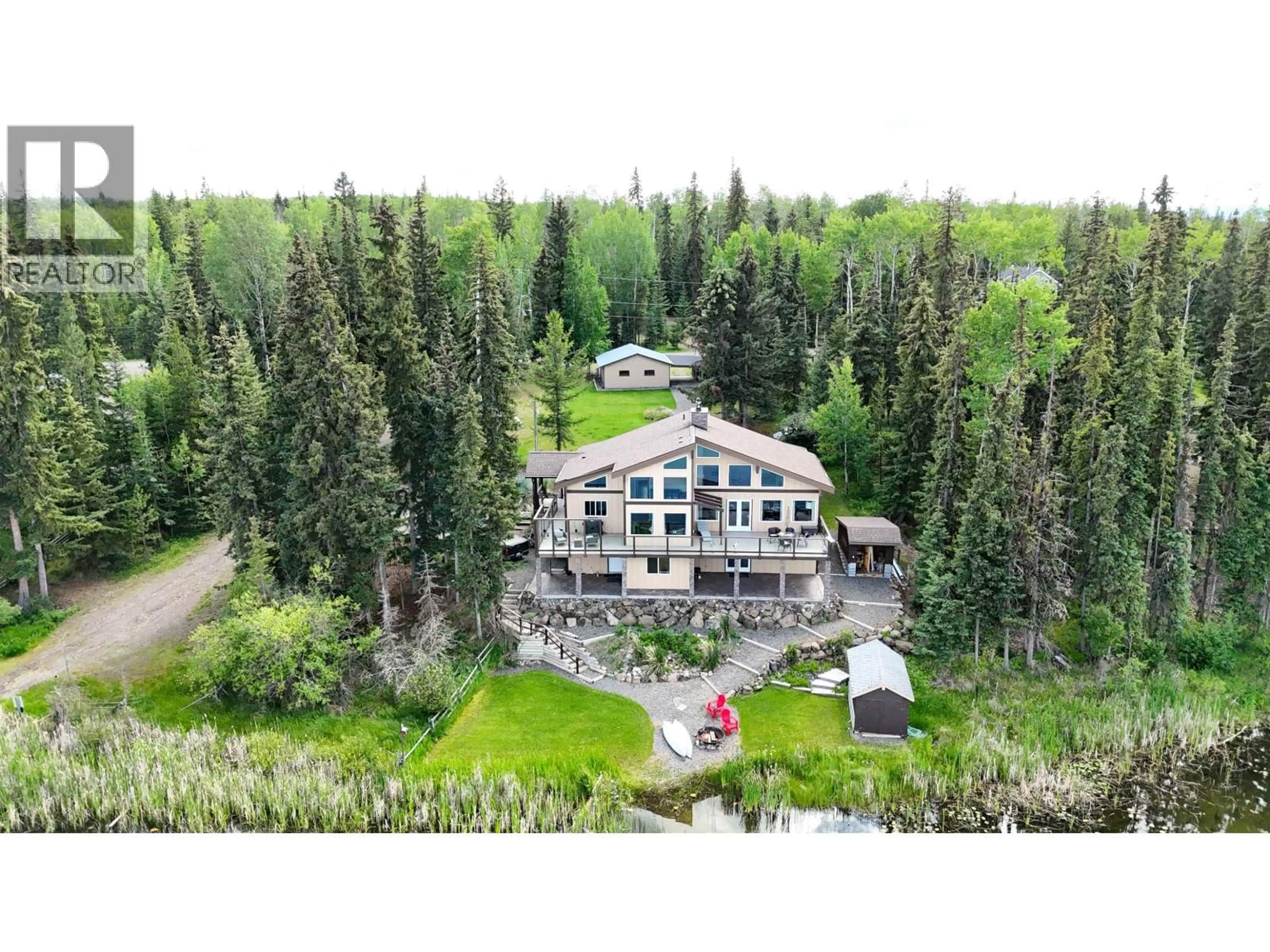 A pic from outside/outdoor area/front of a property/back of a property/a pic from drone, unknown for 6323 MOOSE POINT DRIVE, 100 Mile House British Columbia V0K2K1