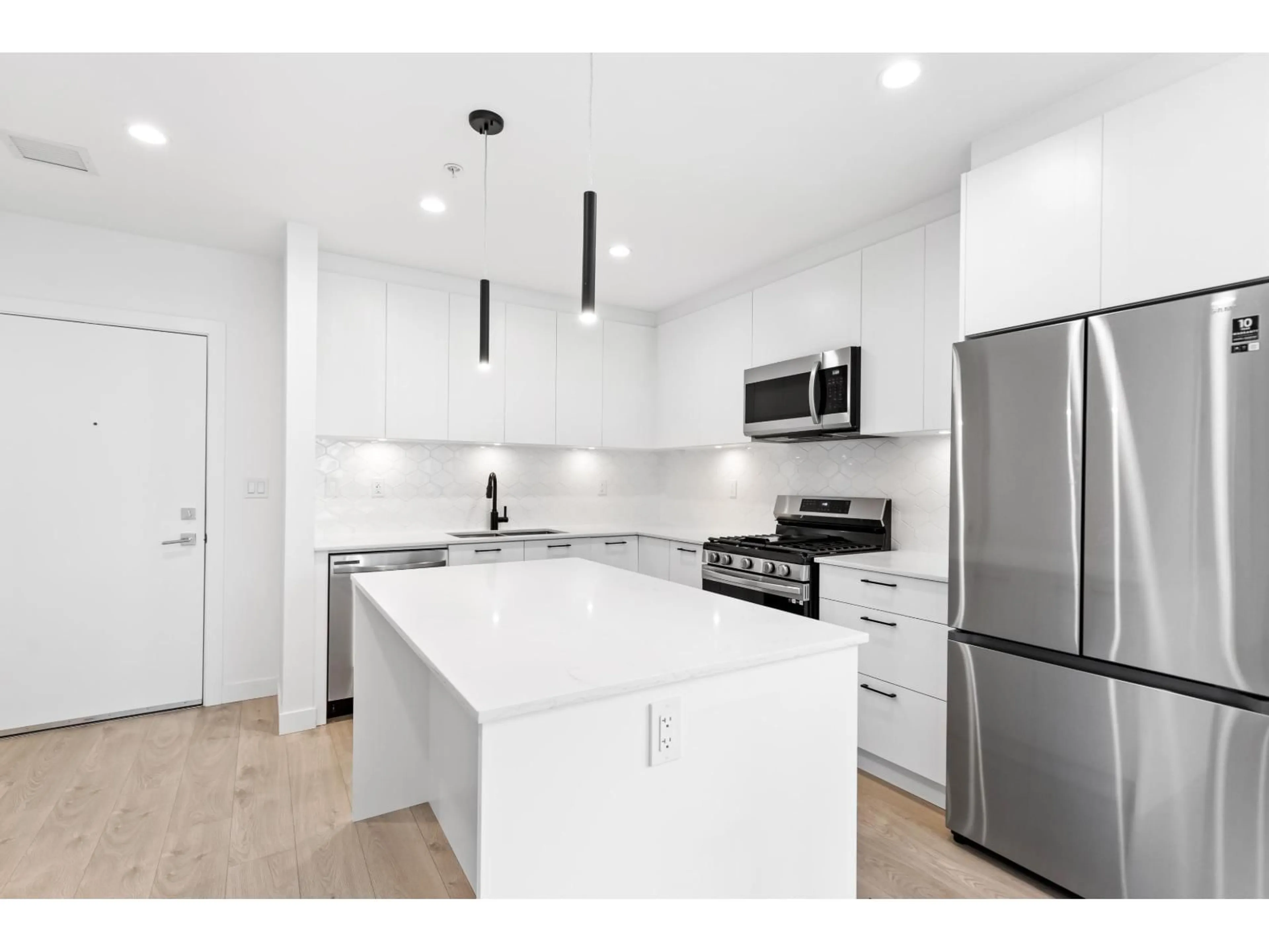 Open concept kitchen, unknown for 403 - 20019 83A AVENUE, Langley British Columbia V2Y5K6