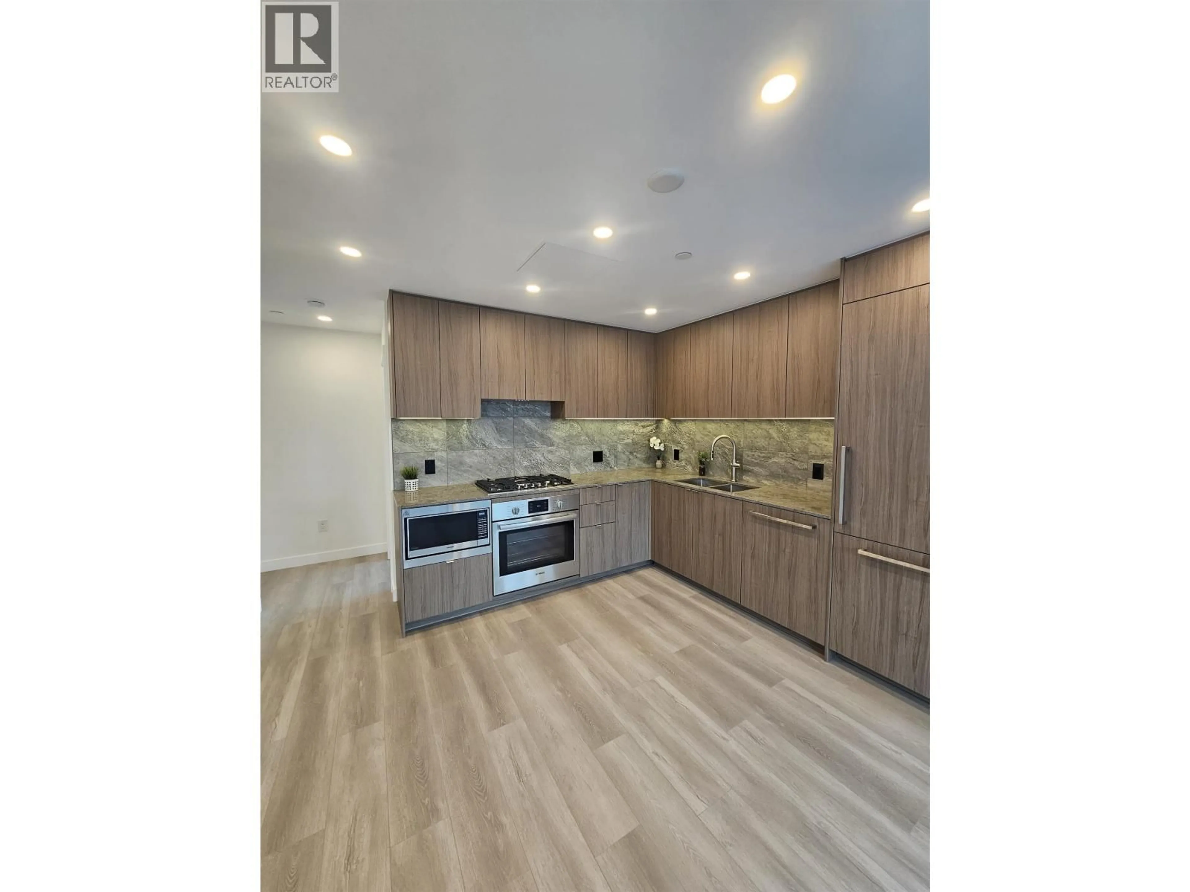 Open concept kitchen, wood/laminate floor for 2010 - 626 CLAREMONT STREET, Coquitlam British Columbia V3J3T4