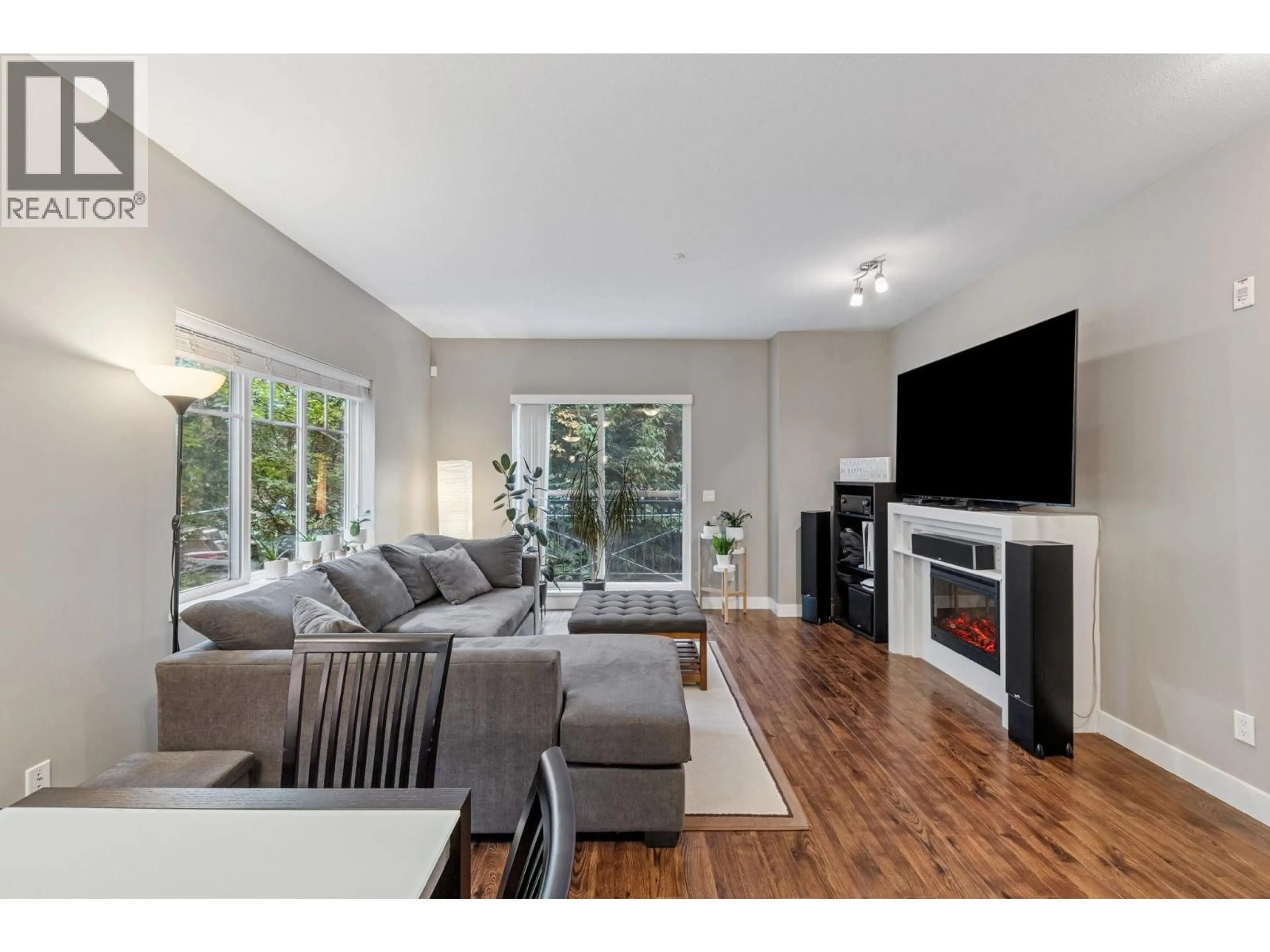 Living room with furniture, wood/laminate floor for 207 - 3888 NORFOLK STREET, Burnaby British Columbia V5G1E5