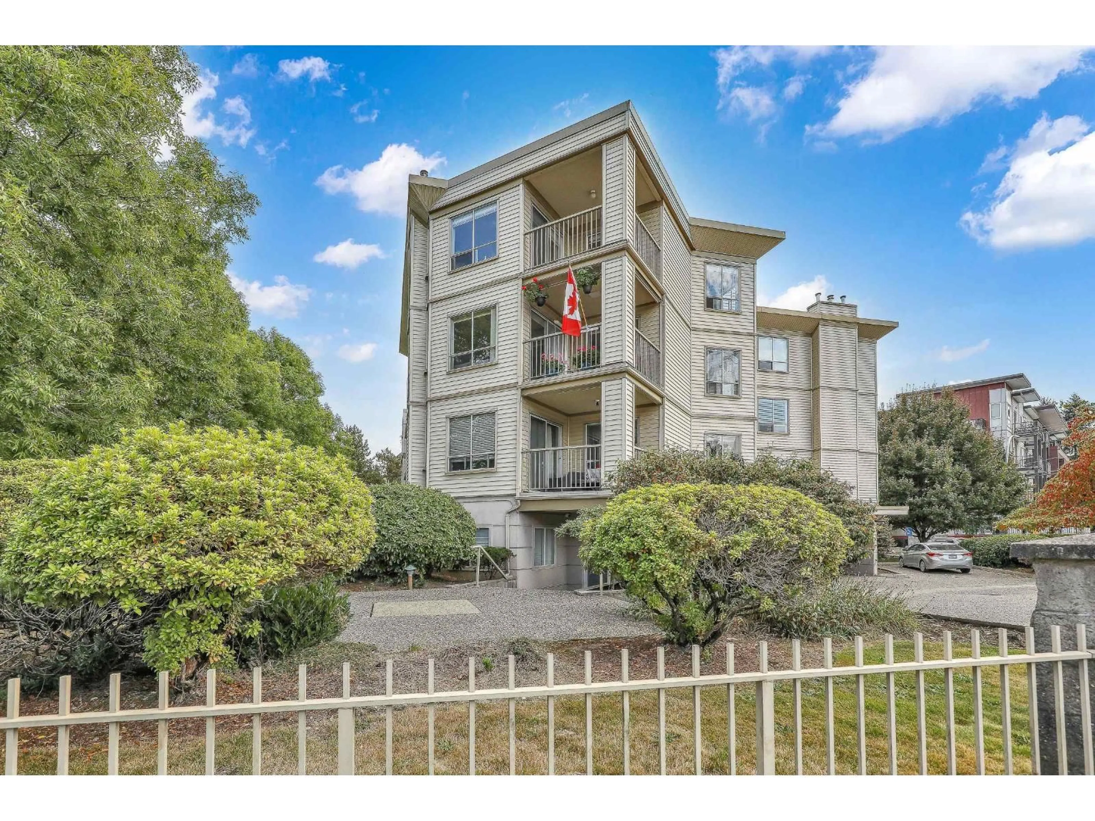 A pic from outside/outdoor area/front of a property/back of a property/a pic from drone, building for 201 - 5450 208, Langley British Columbia V3A2J9