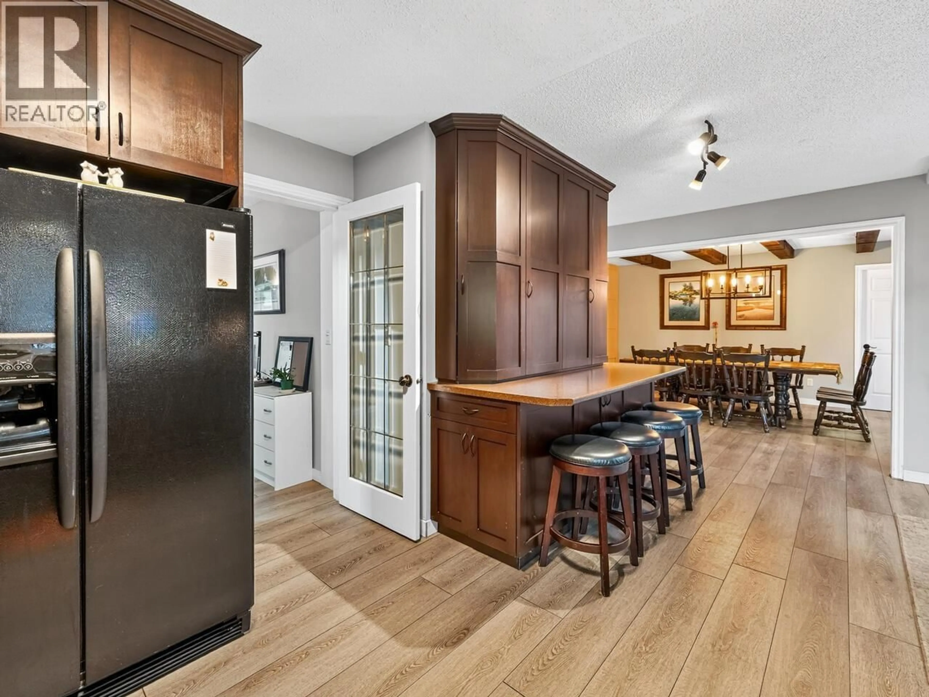 Open concept kitchen, wood/laminate floor for 11790 212 STREET, Maple Ridge British Columbia V2X8P9