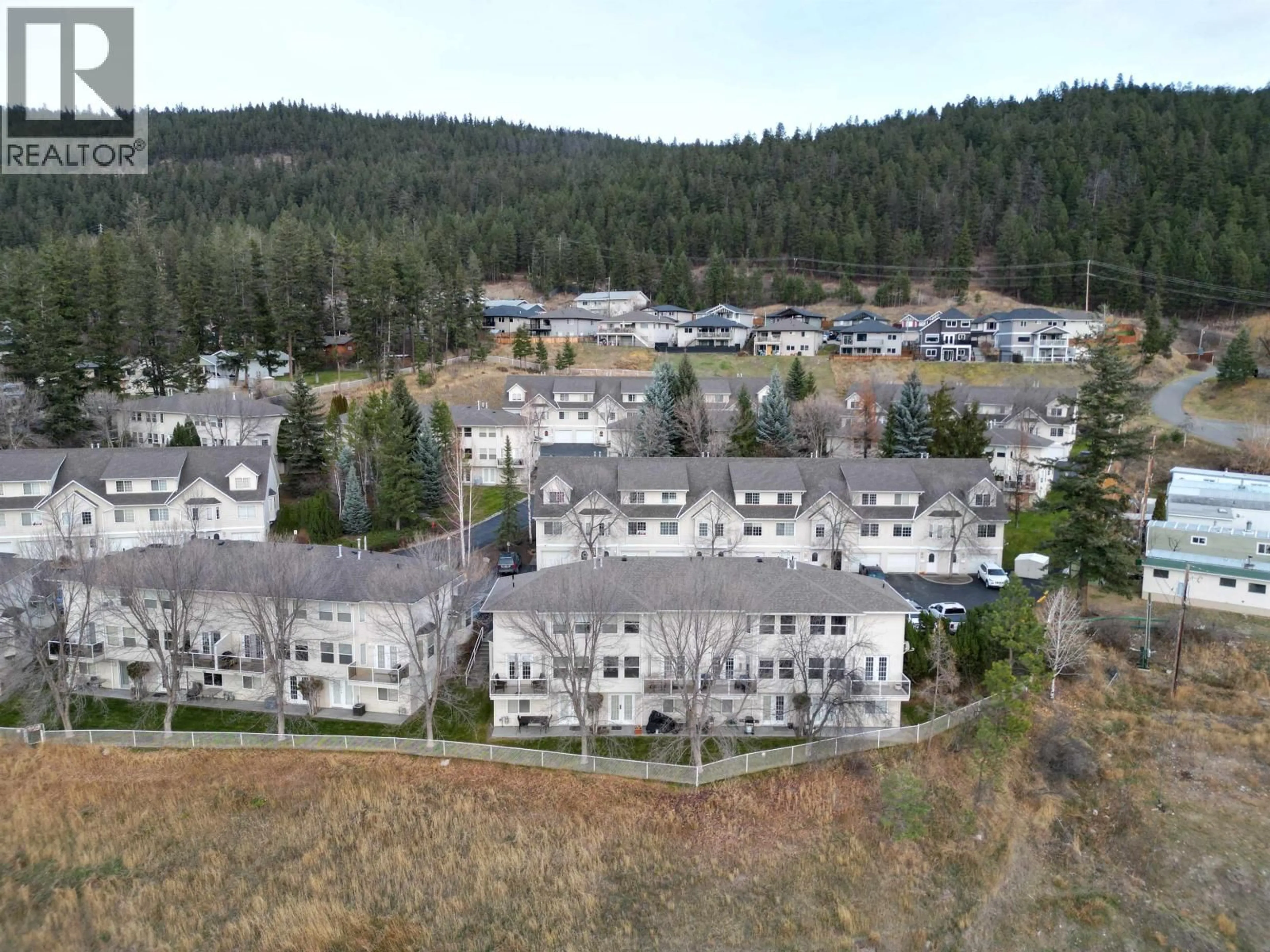 A pic from outside/outdoor area/front of a property/back of a property/a pic from drone, mountain view for 20 - 350 PEARKES DRIVE, Williams Lake British Columbia V2G4T2