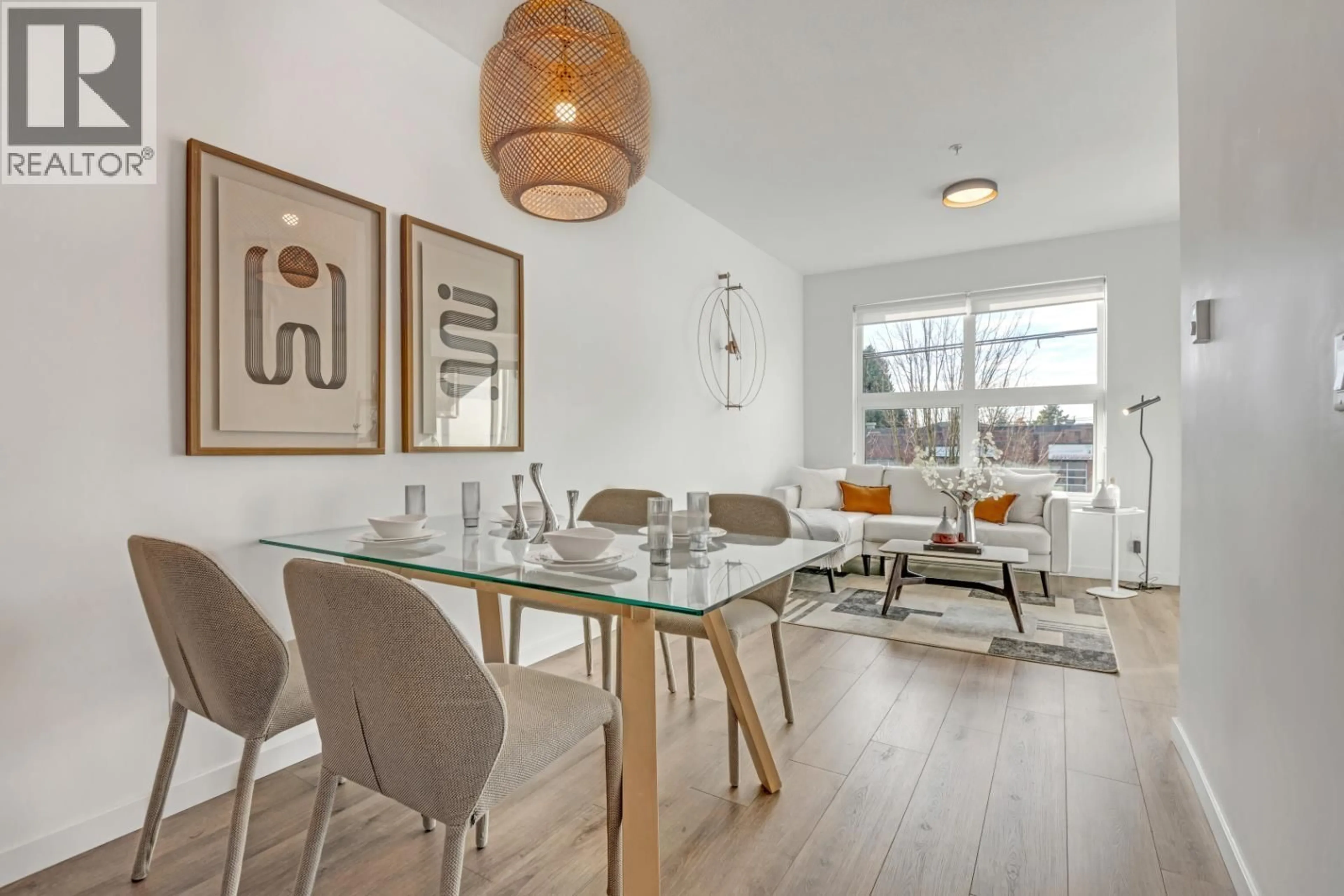 Dining room, wood/laminate floor for 207 - 2239 KINGSWAY, Vancouver British Columbia V5N0E5