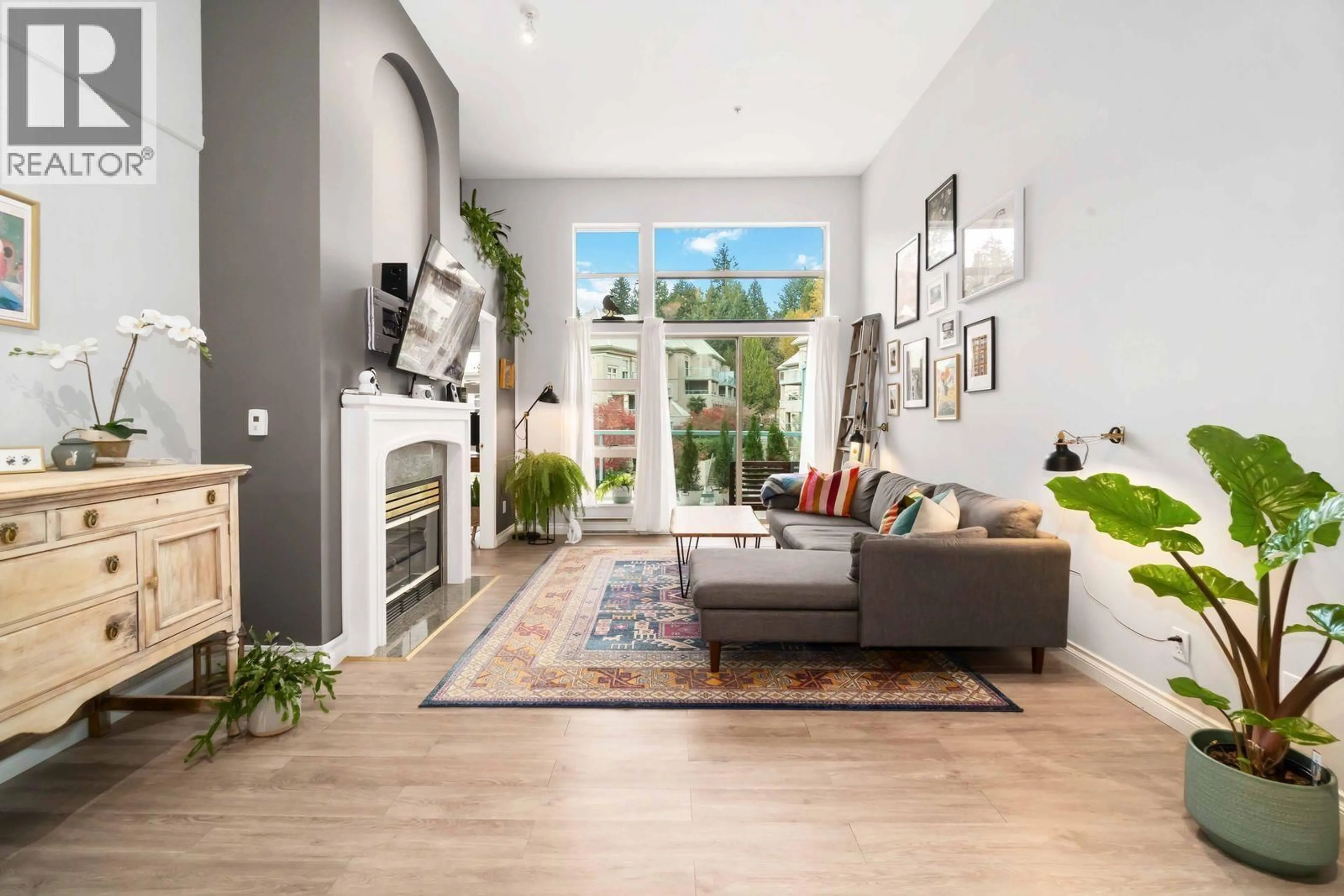 Living room with furniture, unknown for 410 - 301 MAUDE ROAD, Port Moody British Columbia V3H5B1