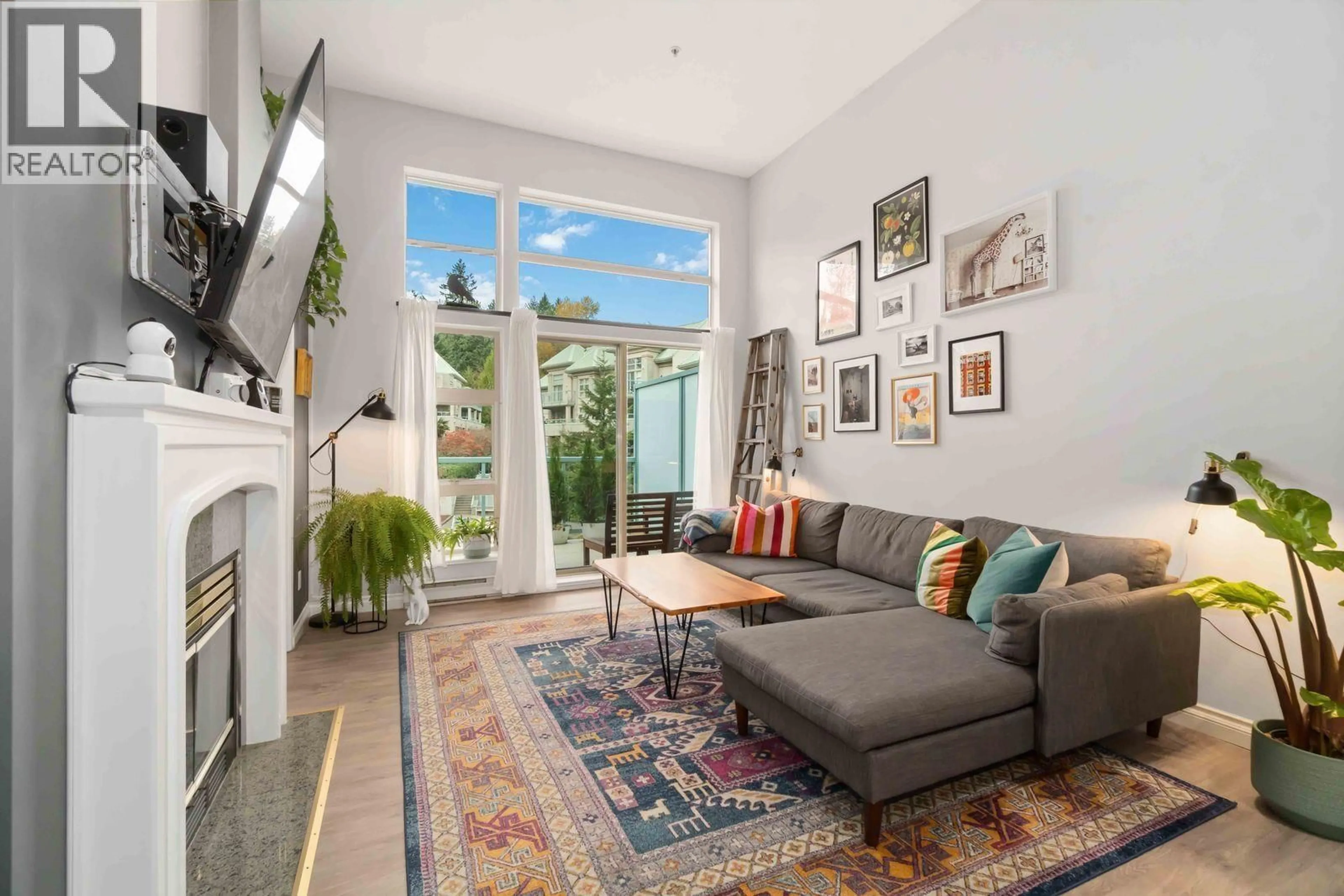 Living room with furniture, unknown for 410 - 301 MAUDE ROAD, Port Moody British Columbia V3H5B1