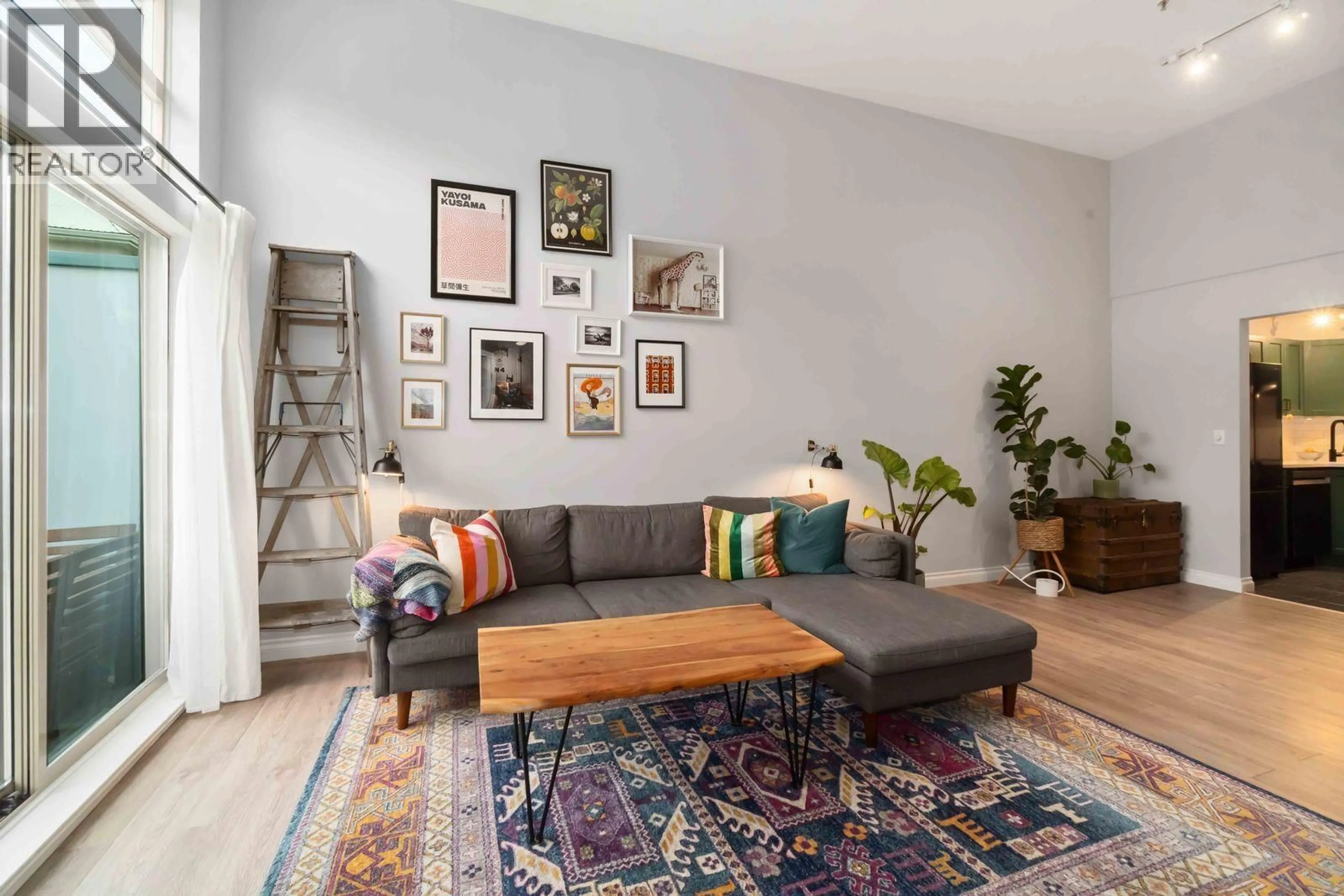 Living room with furniture, unknown for 410 - 301 MAUDE ROAD, Port Moody British Columbia V3H5B1