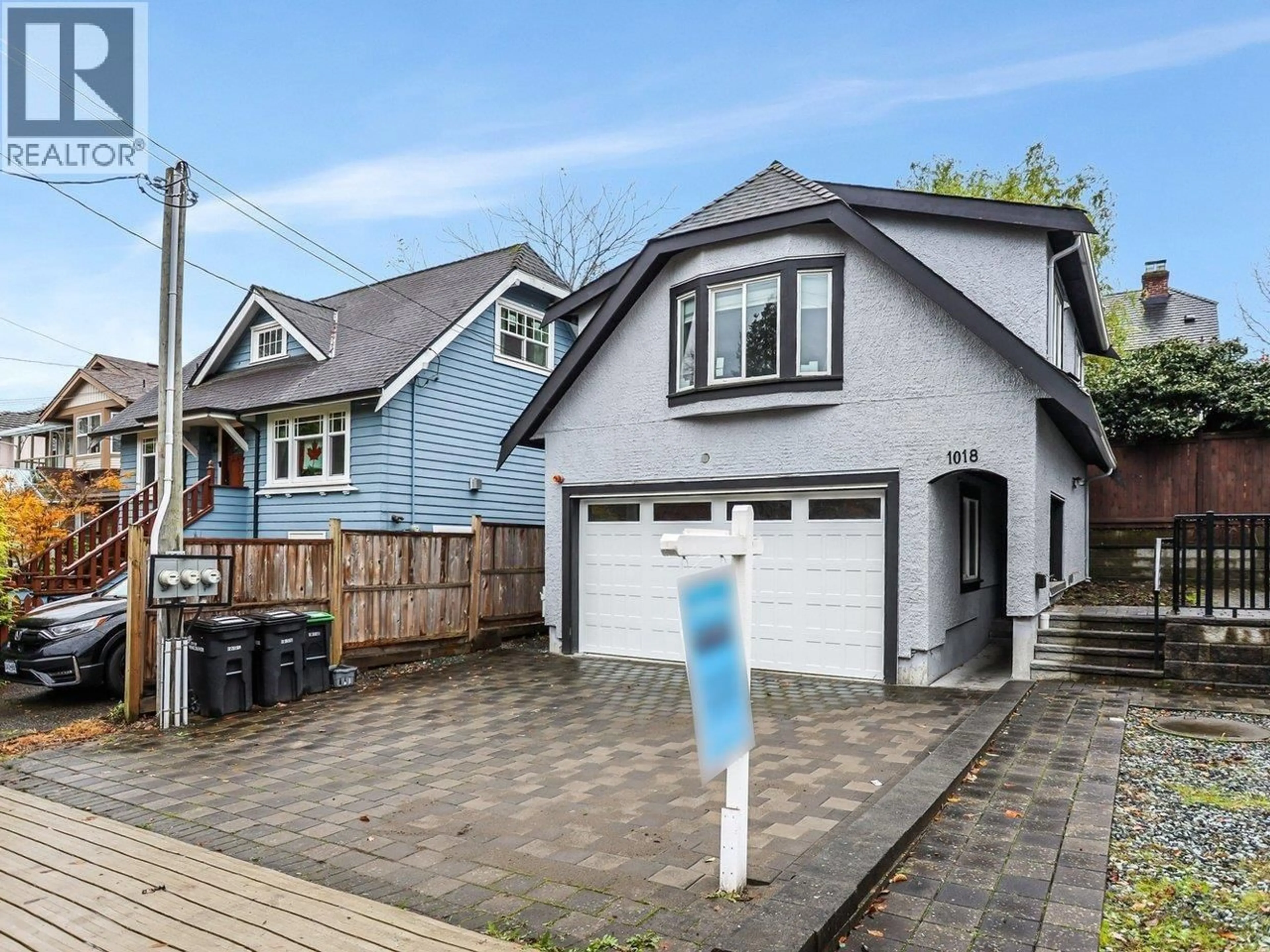 Home with vinyl exterior material, street for 1018 24TH AVENUE, Vancouver British Columbia V5V2B1
