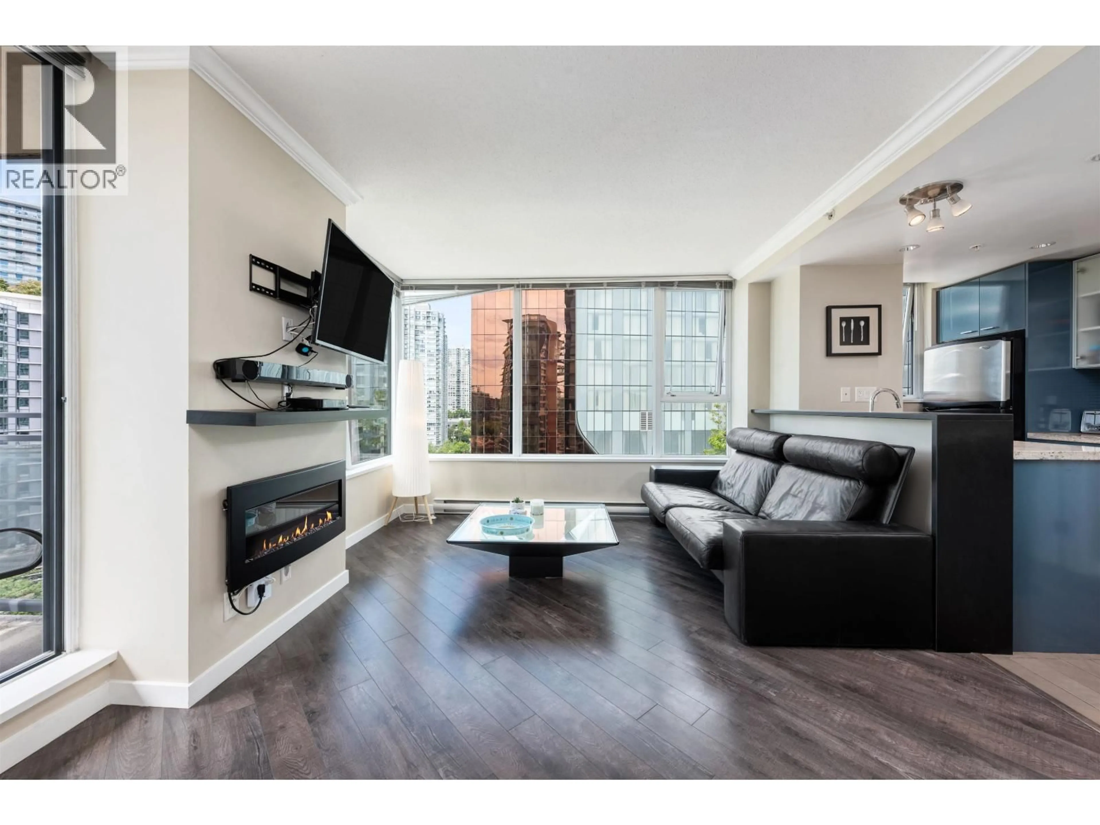 Living room with furniture, wood/laminate floor for 1606 - 33 SMITHE STREET, Vancouver British Columbia V6B0B5