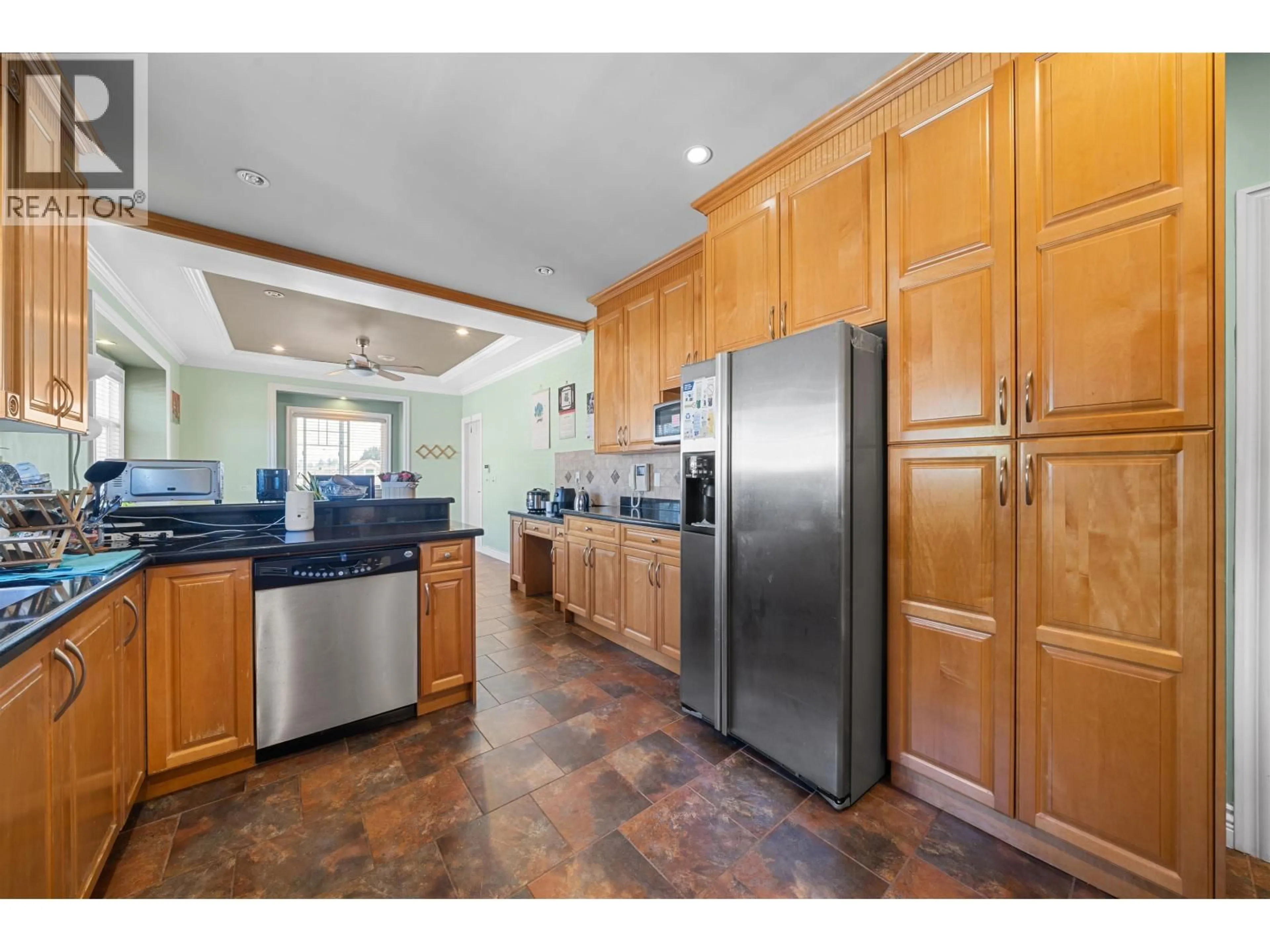 Open concept kitchen, ceramic/tile floor for 7722 12TH AVENUE, Burnaby British Columbia V3N2K5